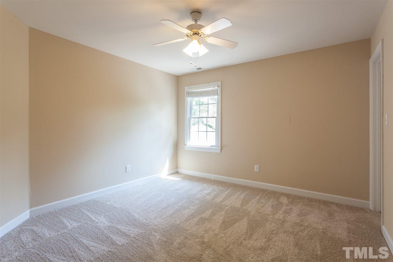 2613 Lizei Street Raleigh, NC 27616 - Photo 22 of 25 a view of an empty room with a window