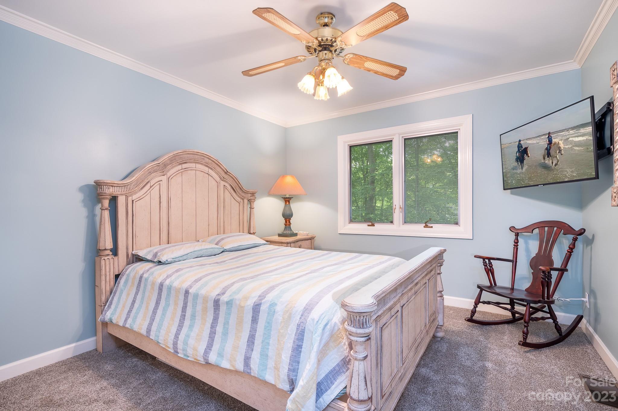 3787 Mill Run Terrell, NC 28682 - Photo 21 of 42 a bedroom with a bed a desk and chair