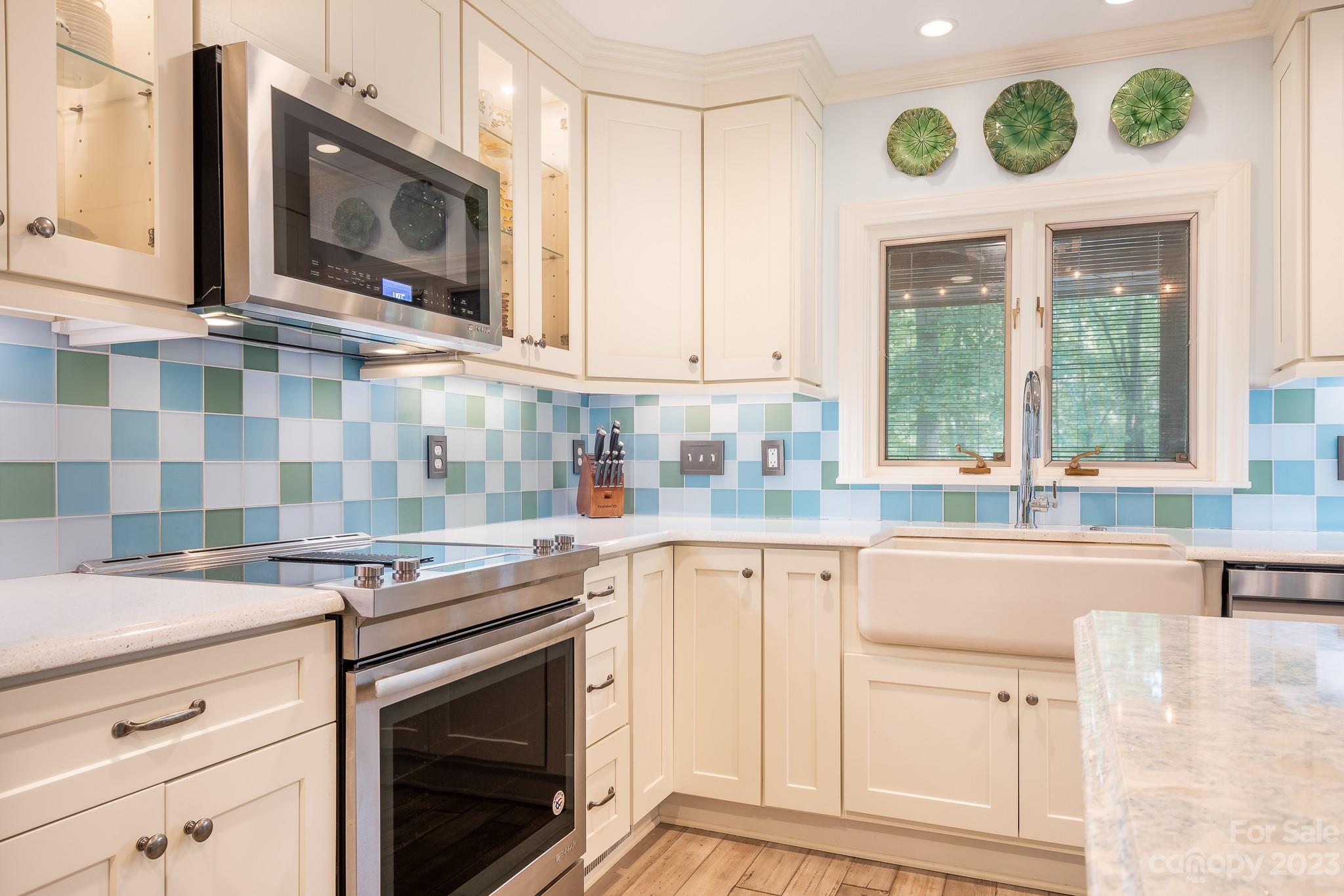 3787 Mill Run Terrell, NC 28682 - Photo 3 of 42 a kitchen with cabinets appliances and a window