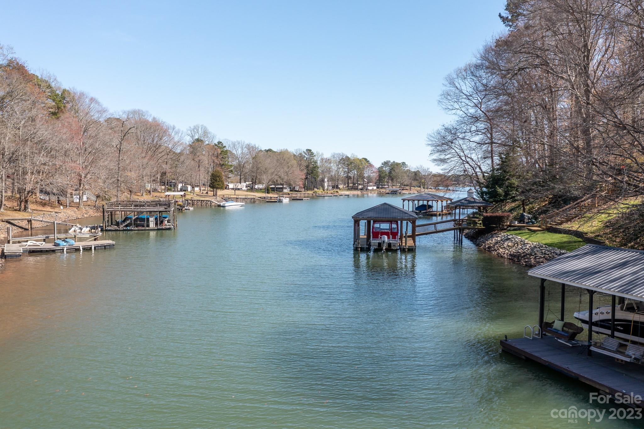 3787 Mill Run Terrell, NC 28682 - Photo 40 of 42 a view of a lake with boats and trees in the background