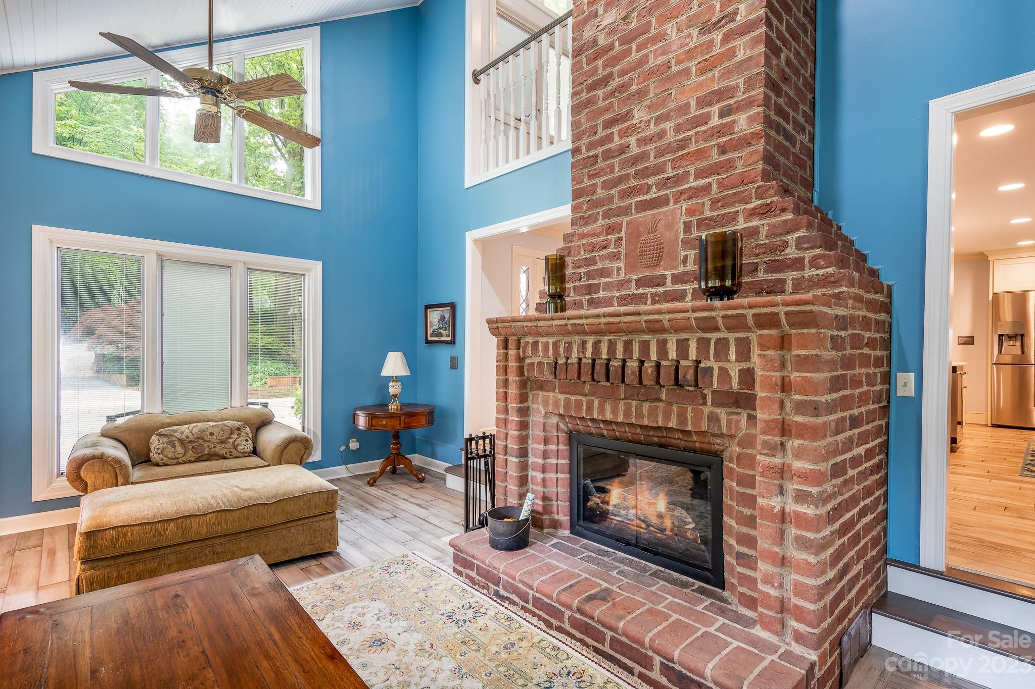 3787 Mill Run Terrell, NC 28682 - Photo 8 of 42 a living room with furniture and a fireplace