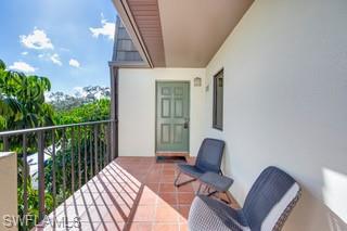 1645 Spoonbill Lane, Unit C Naples, FL 34105 - Photo 20 of 50 View of balcony