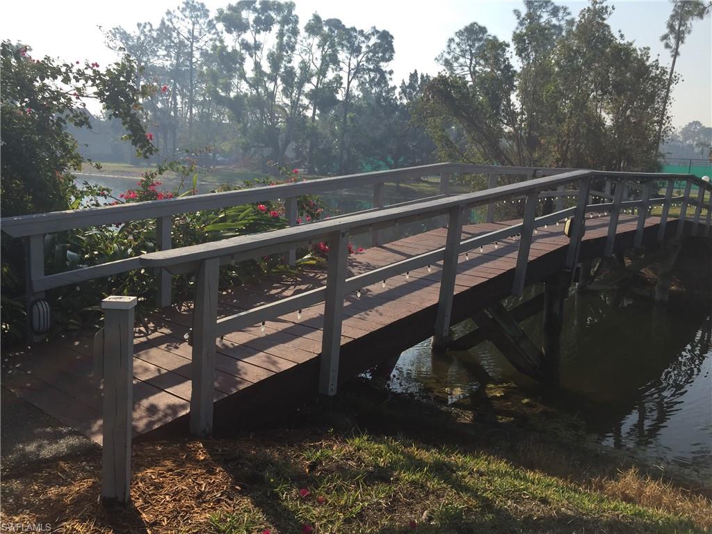 1645 Spoonbill Lane, Unit C Naples, FL 34105 - Photo 42 of 50 View of wooden terrace
