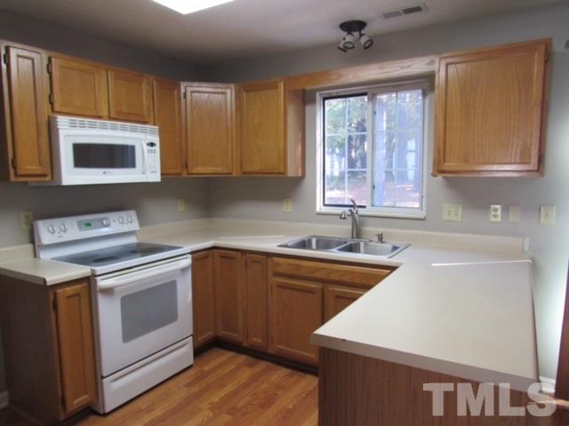 2417 Tusket Court Raleigh, NC 27613 - Photo 5 of 25 Gallery Image 5