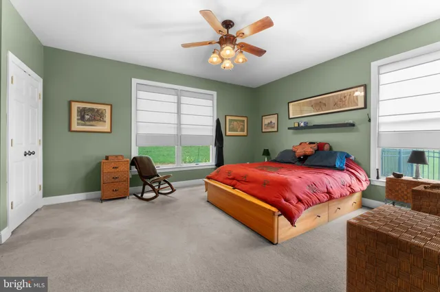a kitchen with stainless steel appliances a refrigerator and a stove top oven