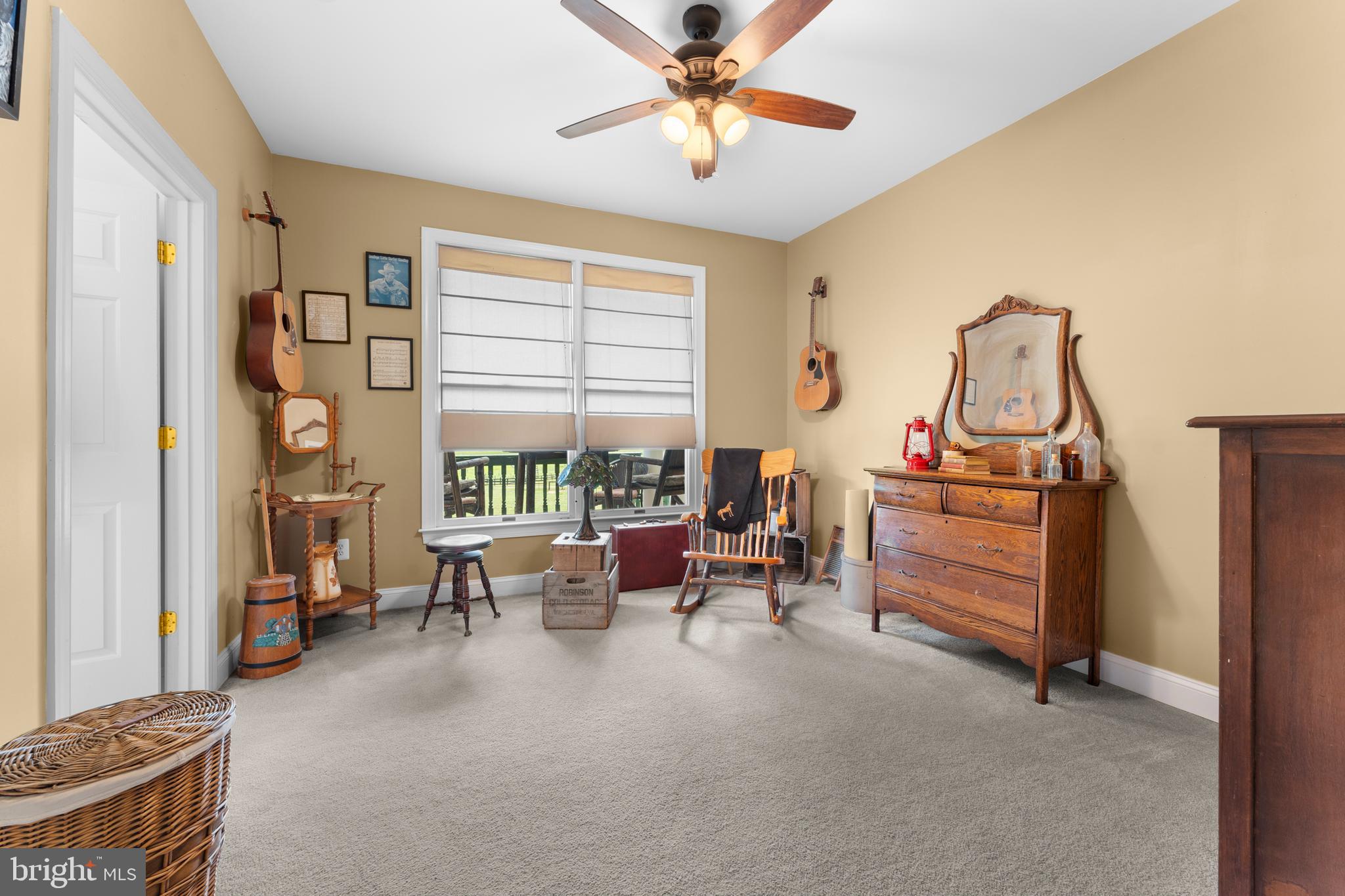 8260 River Hills Lane Rixeyville, VA 22737 - Photo 30 of 104 a living room with furniture and a window