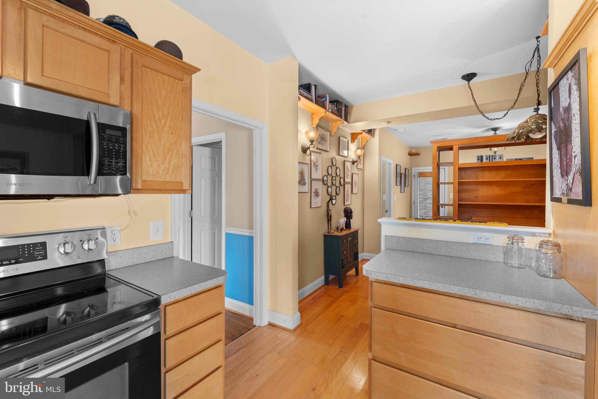 8260 River Hills Lane Rixeyville, VA 22737 - Photo 49 of 104 a kitchen with stainless steel appliances granite countertop a refrigerator and a stove top oven