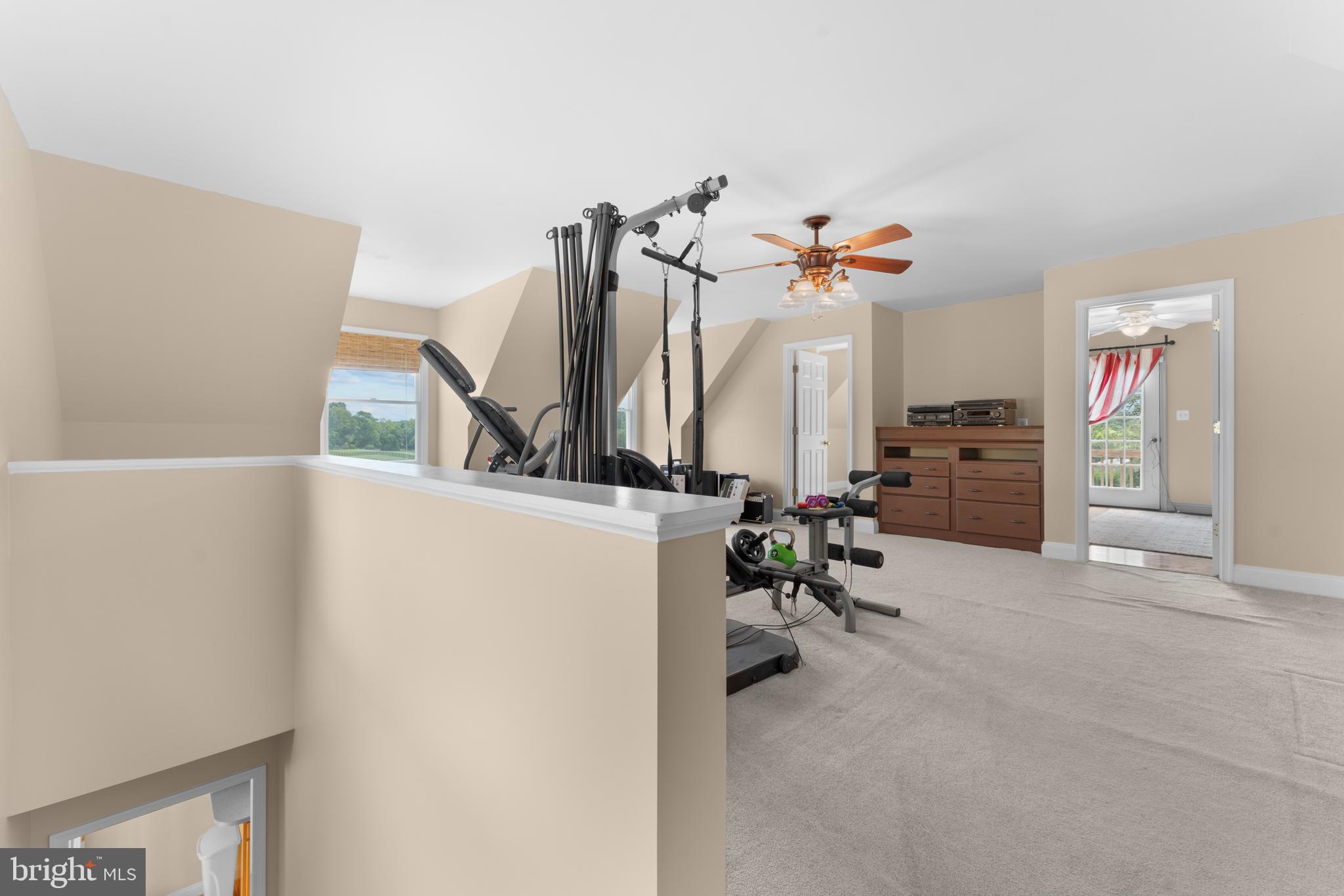 8260 River Hills Lane Rixeyville, VA 22737 - Photo 57 of 104 a view of living room with furniture and a chandelier