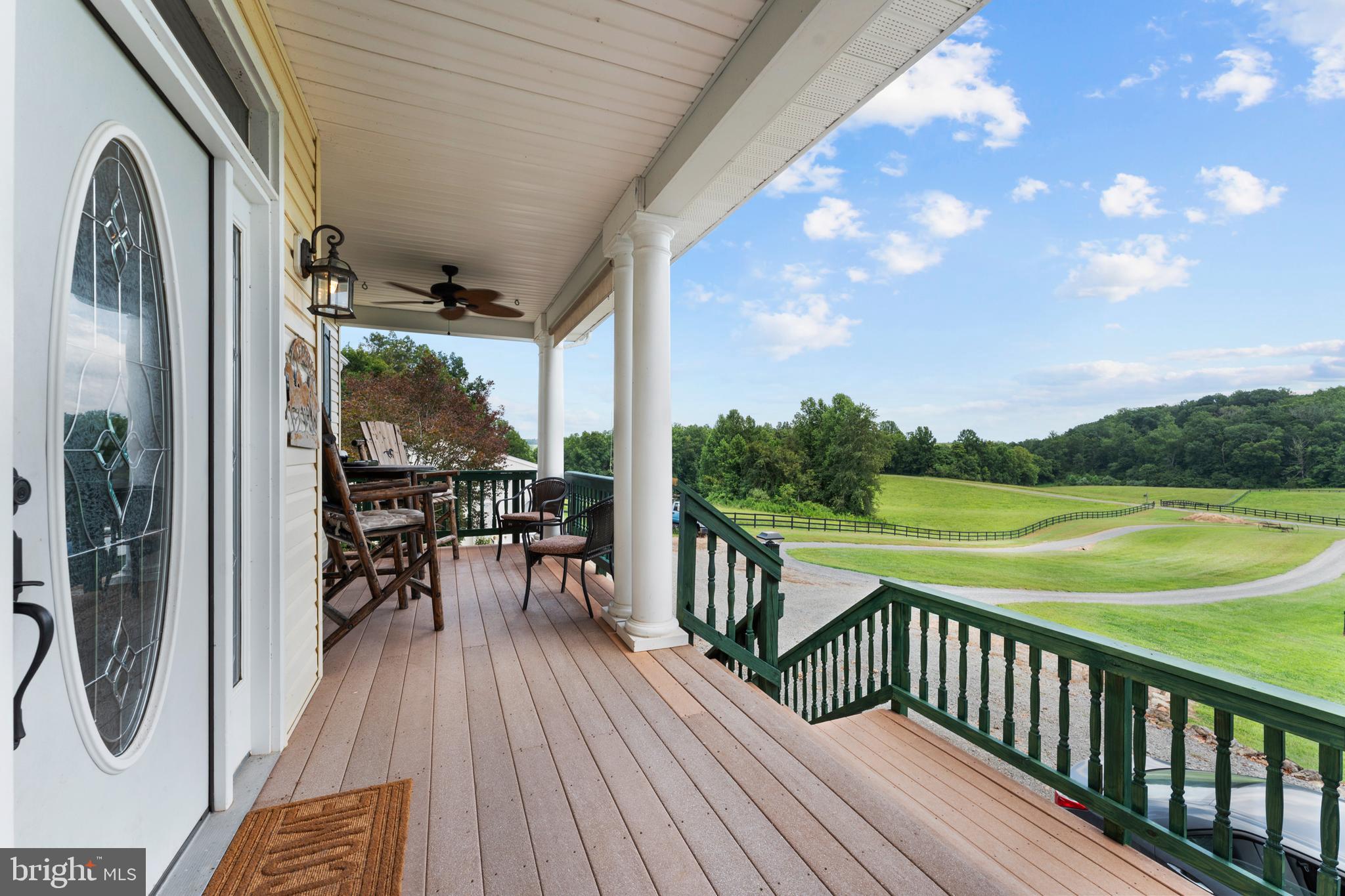 8260 River Hills Lane Rixeyville, VA 22737 - Photo 9 of 104 a view of balcony with wooden floor and outdoor seating