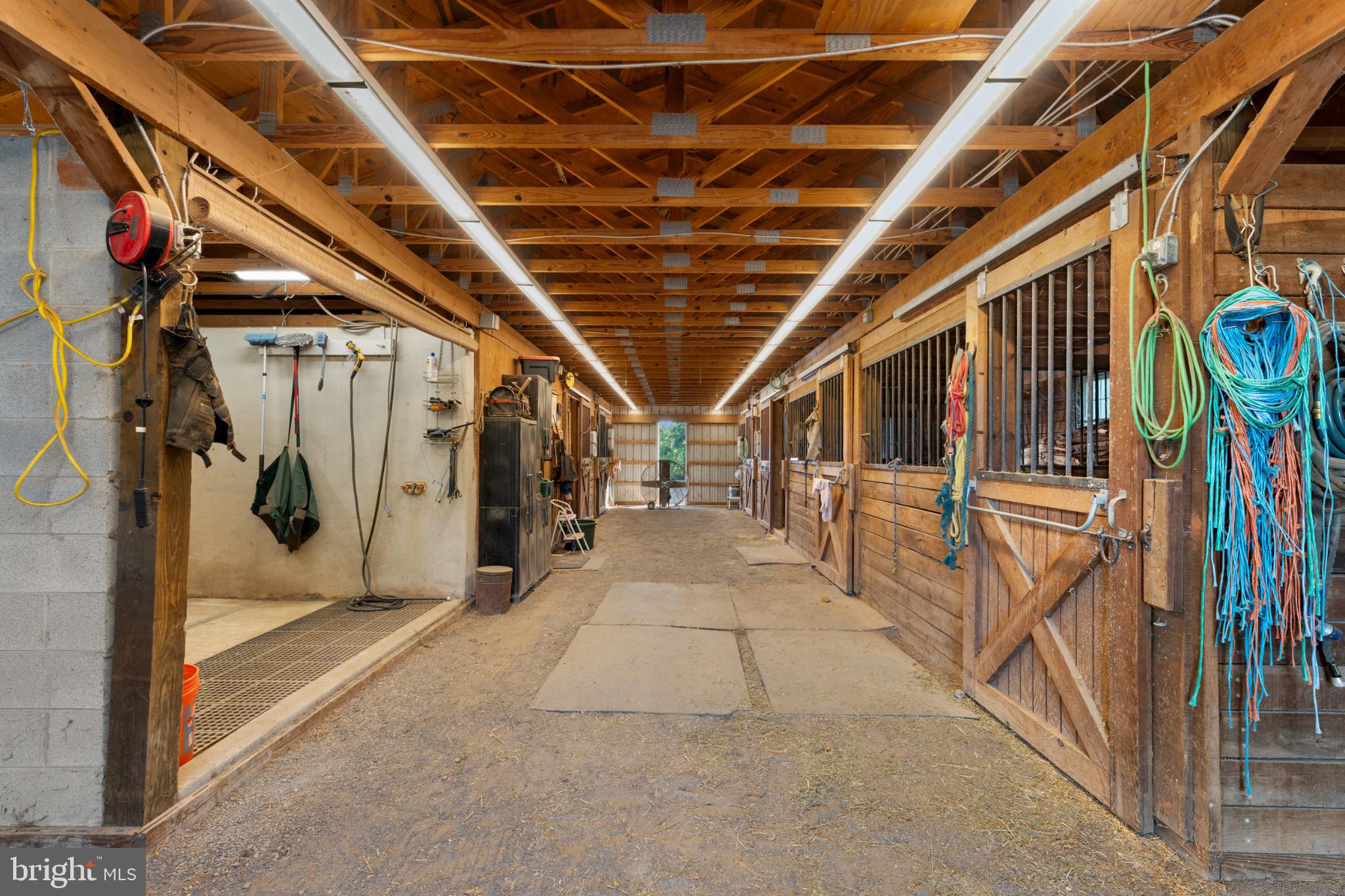 8260 River Hills Lane Rixeyville, VA 22737 - Photo 98 of 104 Spacious equestrian barn with rustic charm.