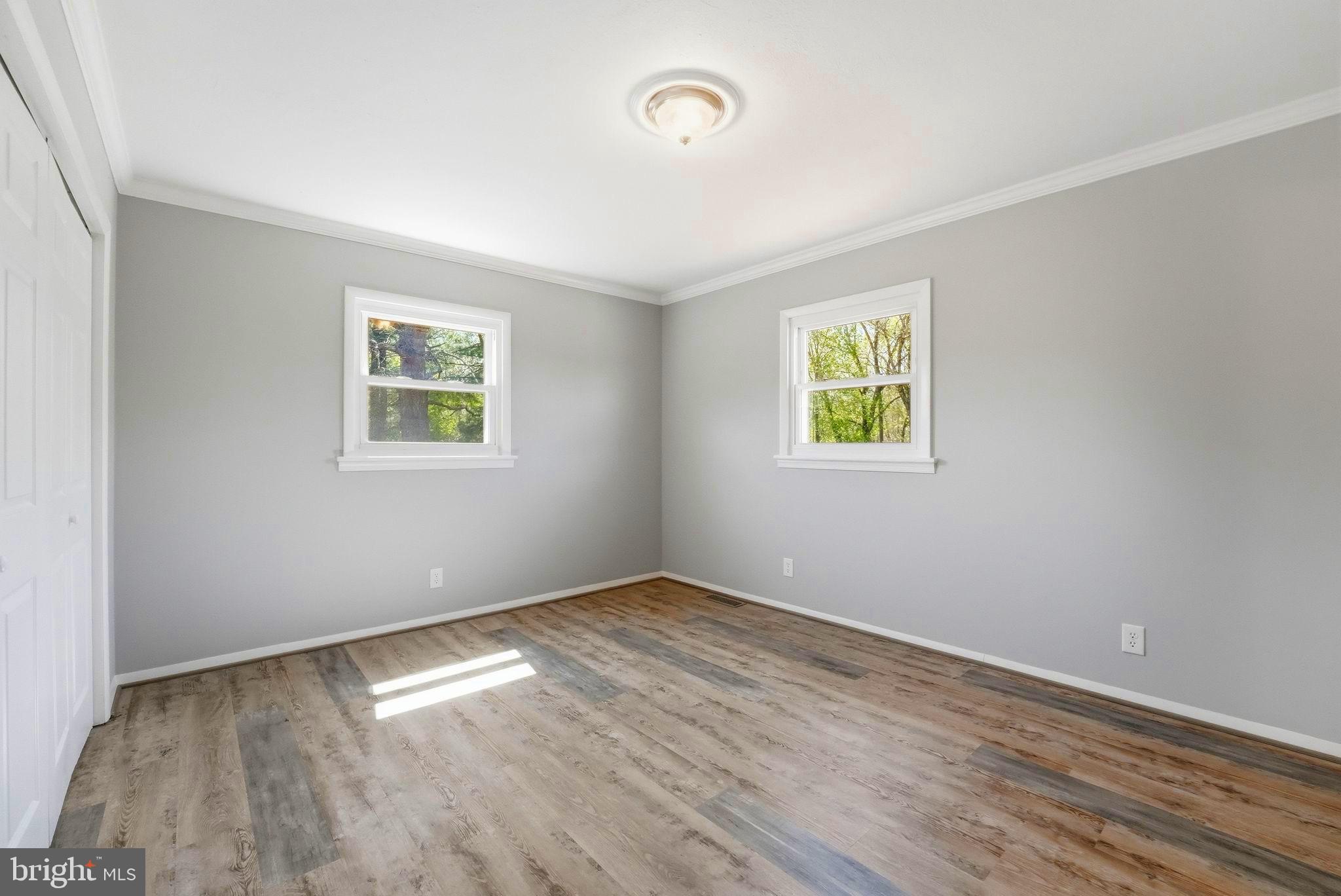 22064 Yellow Bottom Road Lignum, VA 22726 - Photo 26 of 50 an empty room with windows and closet