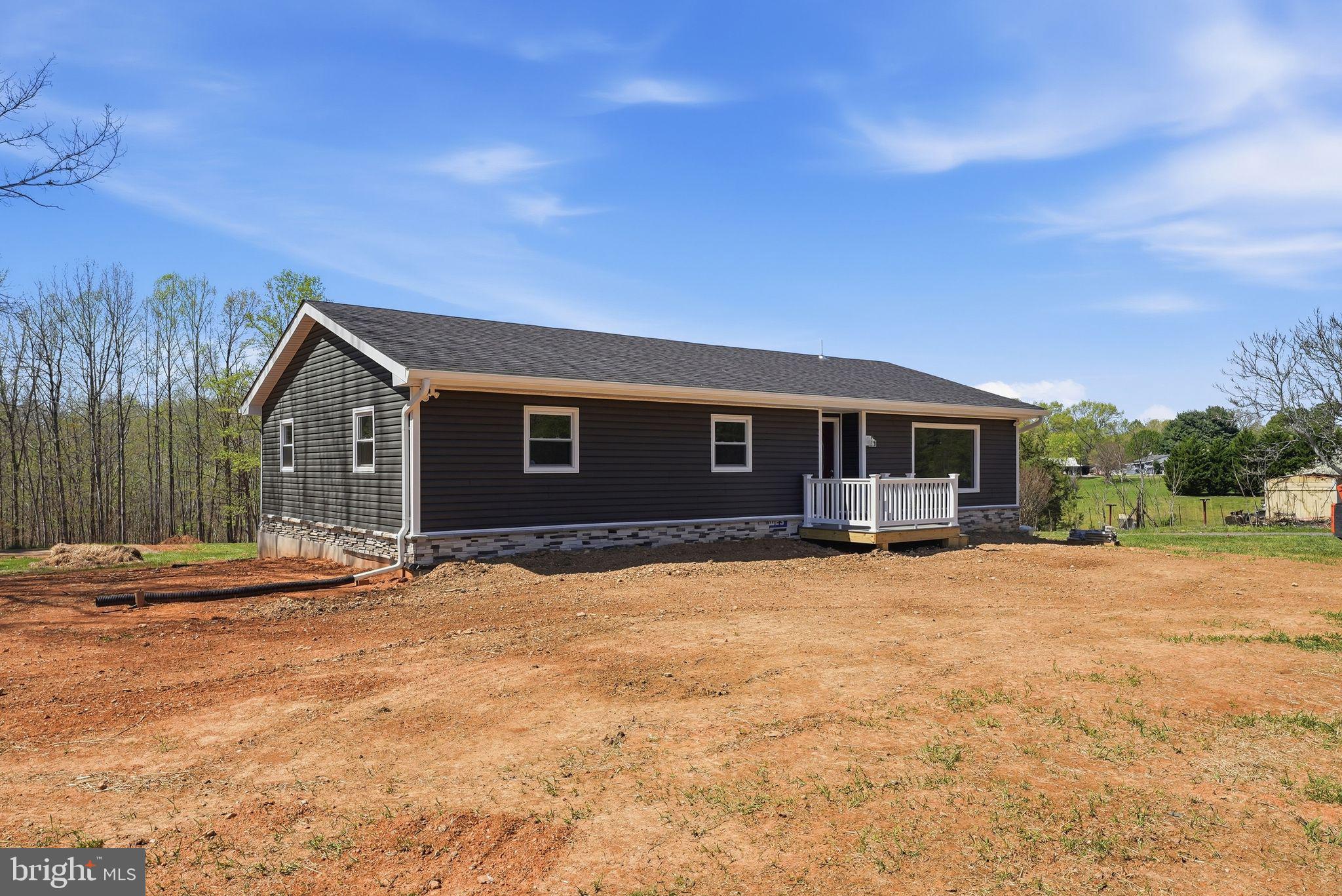 22064 Yellow Bottom Road Lignum, VA 22726 - Photo 34 of 50 a house with yard in front of it