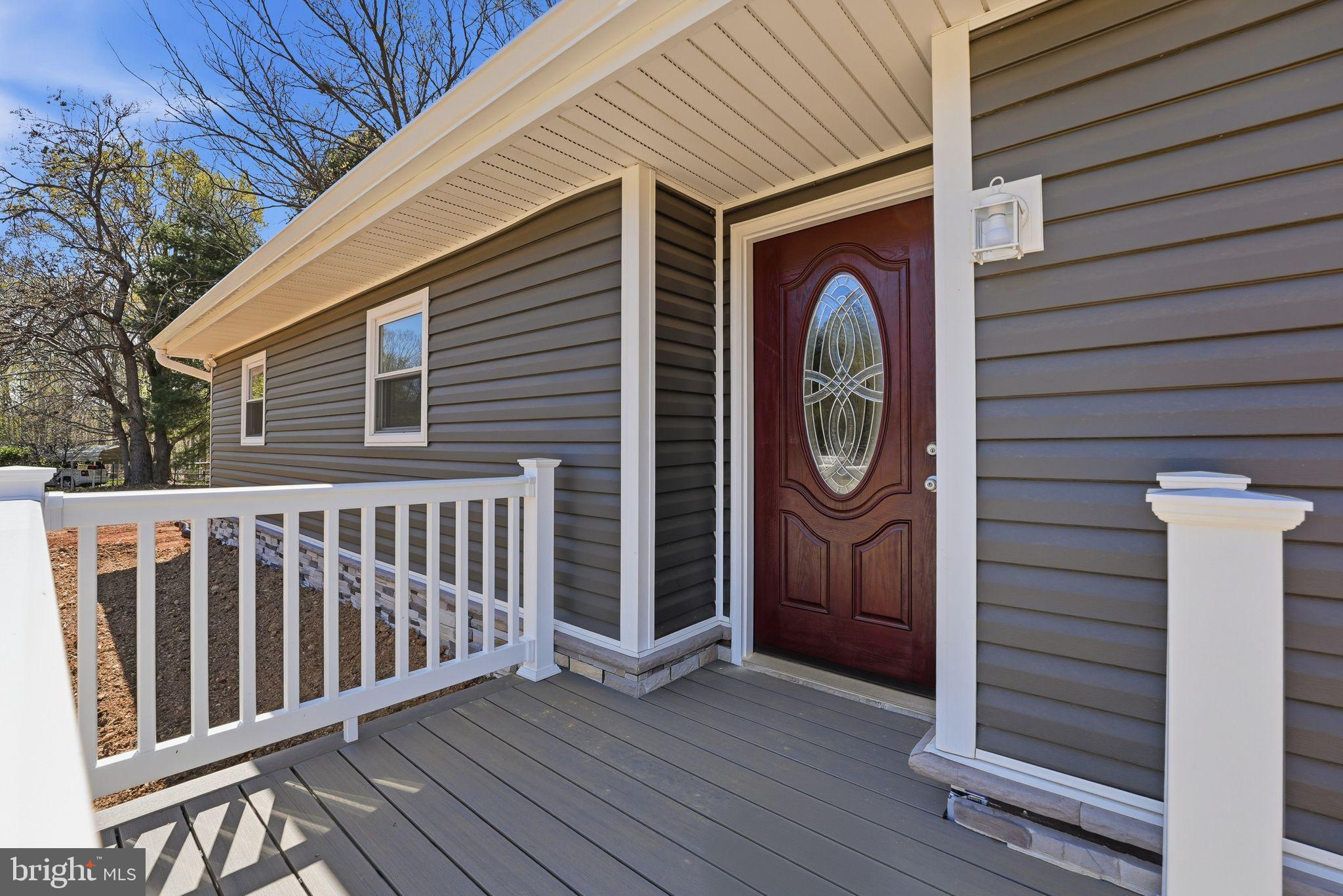 22064 Yellow Bottom Road Lignum, VA 22726 - Photo 35 of 50 a front view of a house with garden