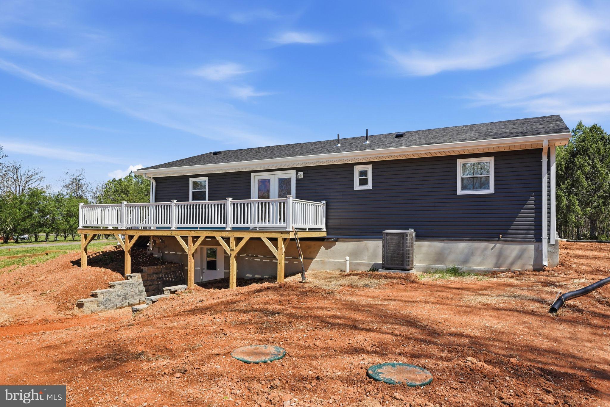 22064 Yellow Bottom Road Lignum, VA 22726 - Photo 37 of 50 a front view of a house with a yard
