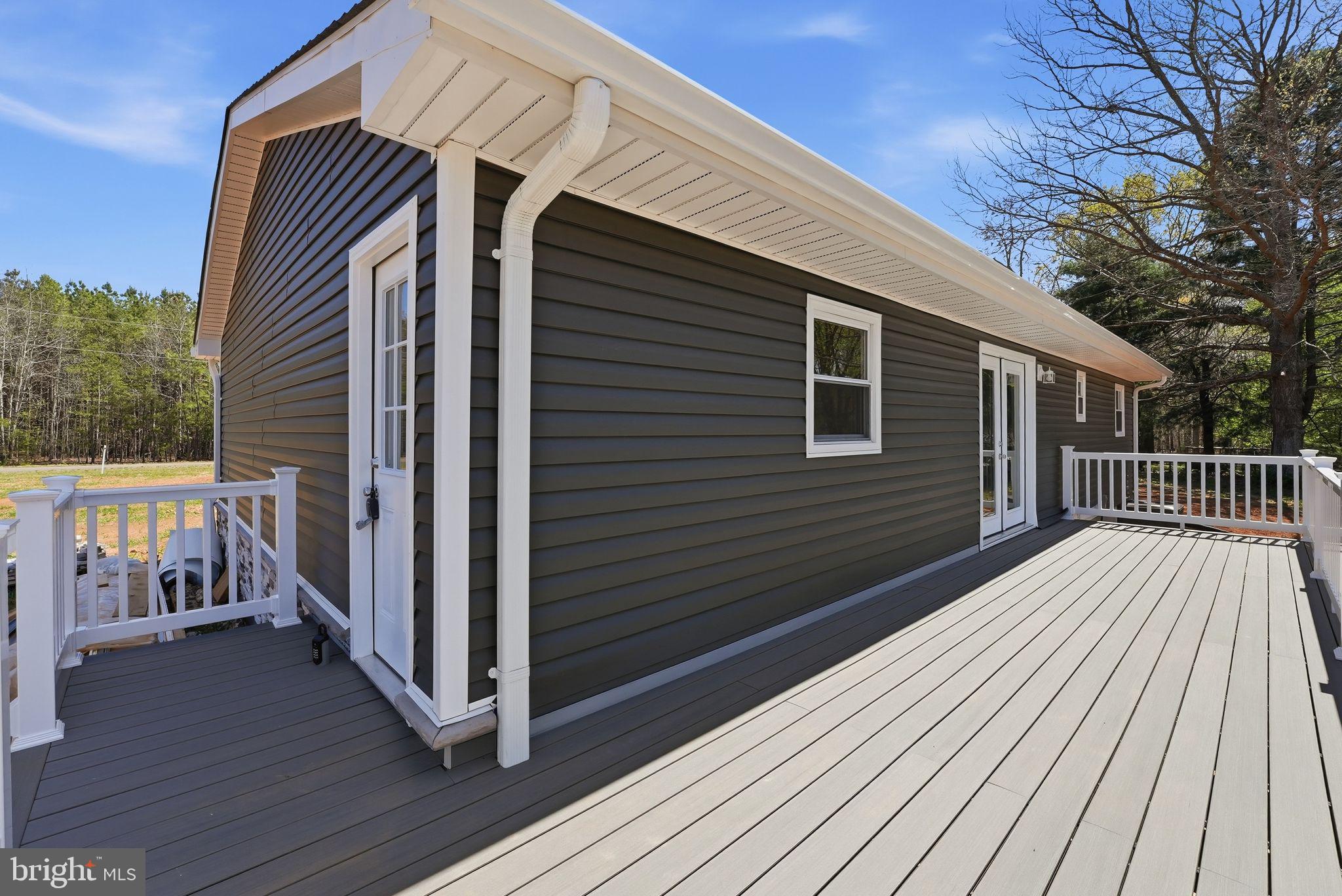 22064 Yellow Bottom Road Lignum, VA 22726 - Photo 39 of 50 a view of a wooden deck