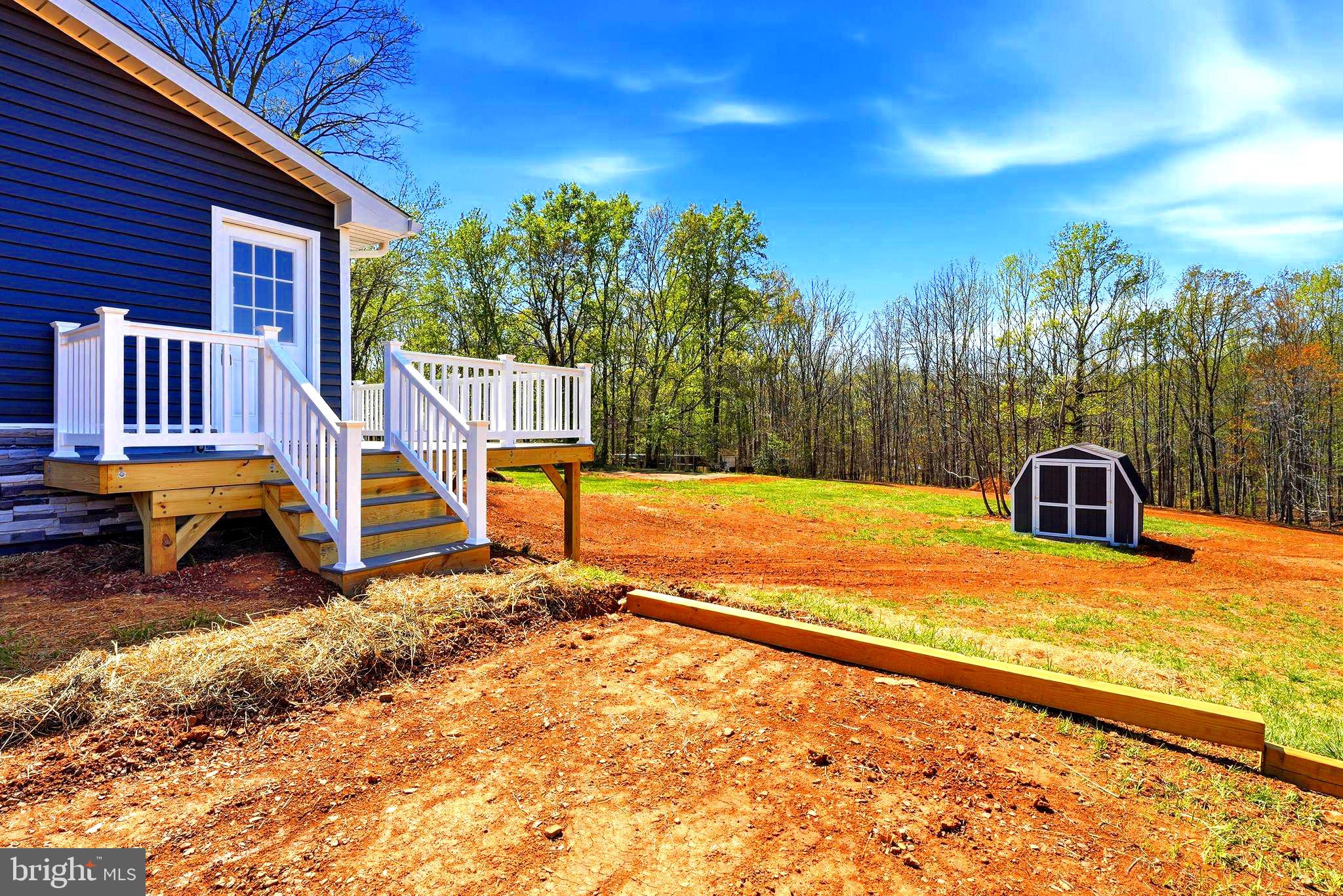 22064 Yellow Bottom Road Lignum, VA 22726 - Photo 44 of 50 a view of a house with backyard and sitting area