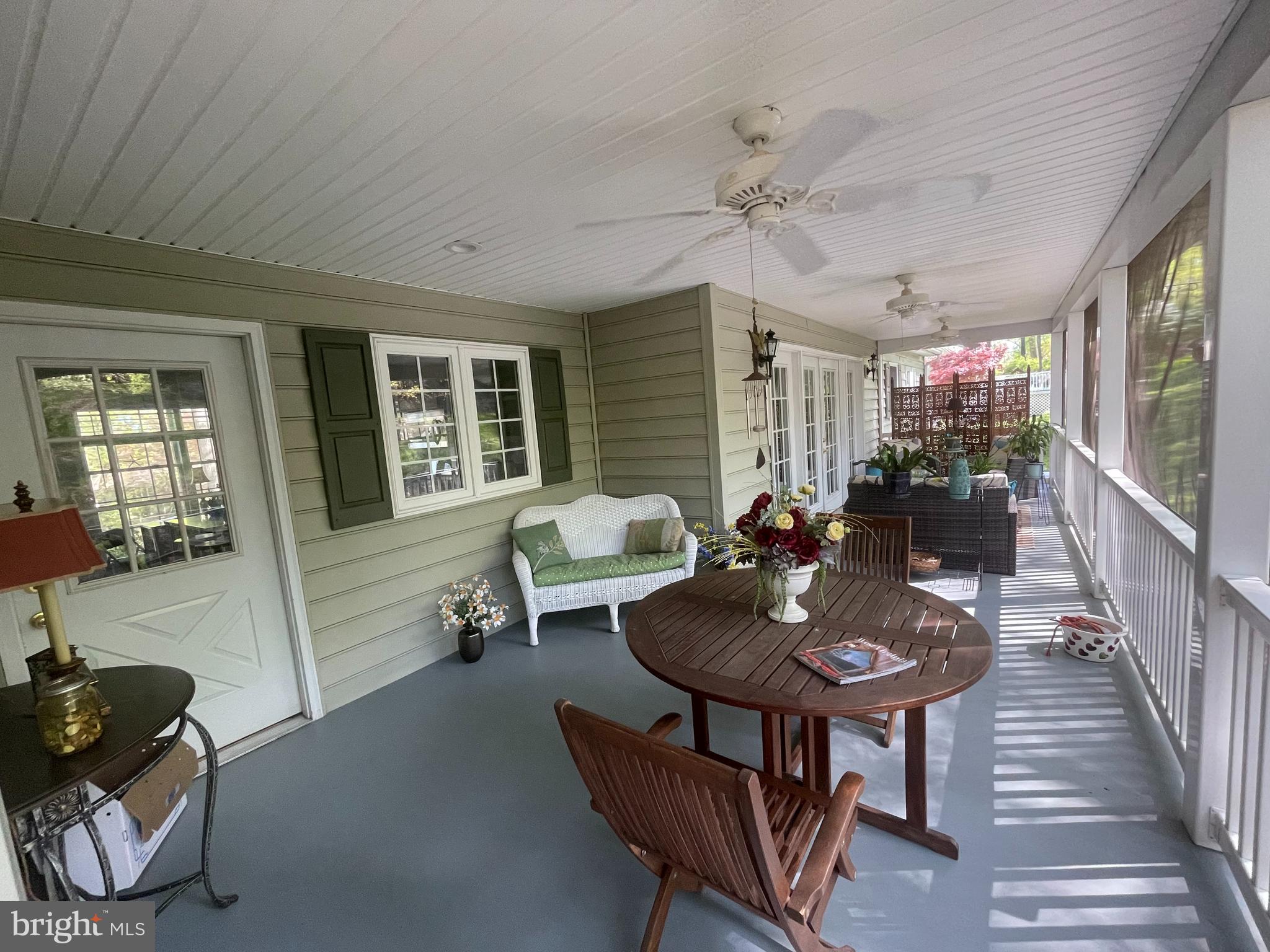 143 Kinlock Road Inwood, WV 25428 - Photo 8 of 59 Screened in porch w/
3 ceiling fans