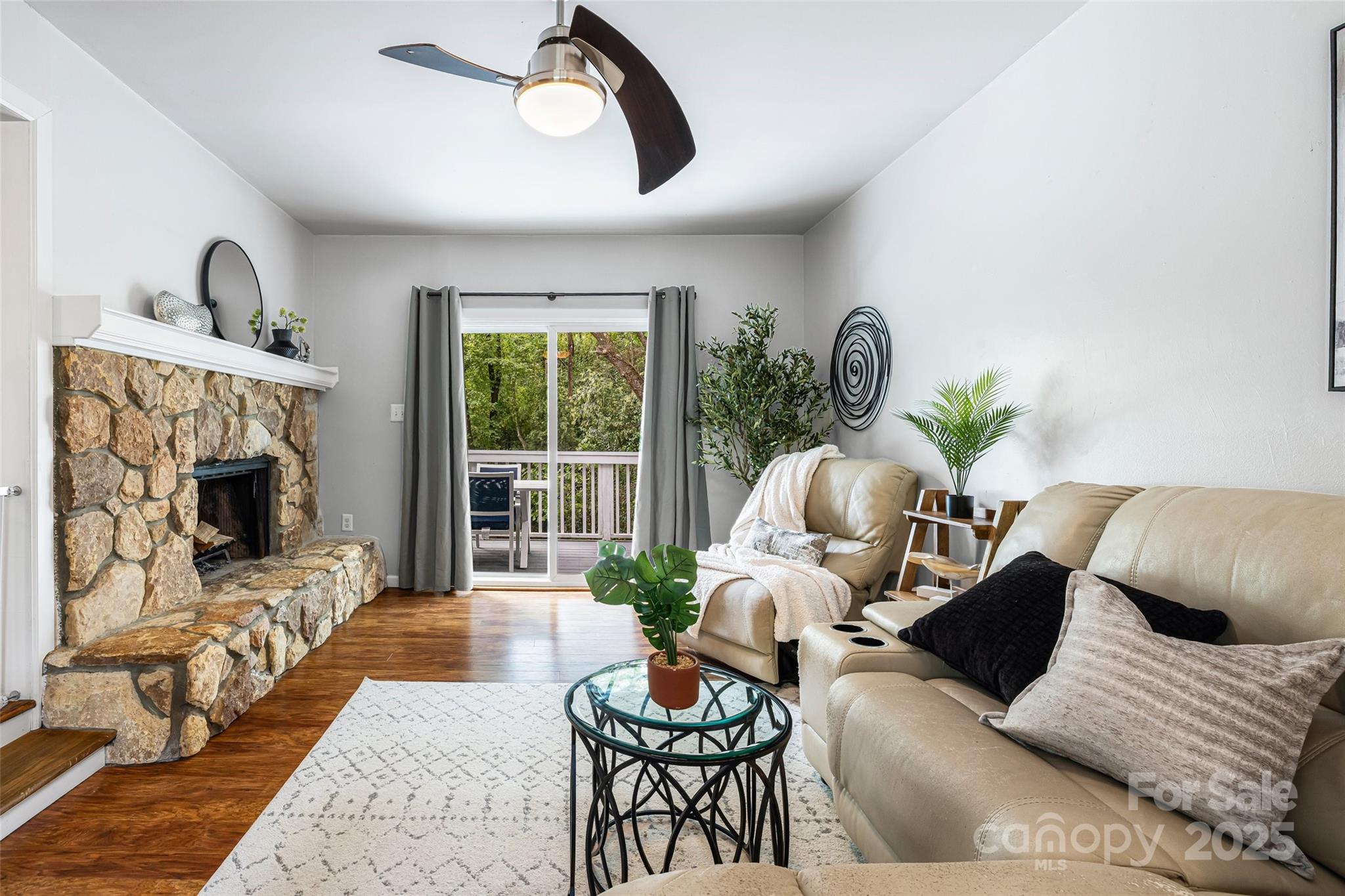 6027 Windjammer Drive Tega Cay, SC 29708 - Photo 15 of 34 a living room with furniture fireplace and window