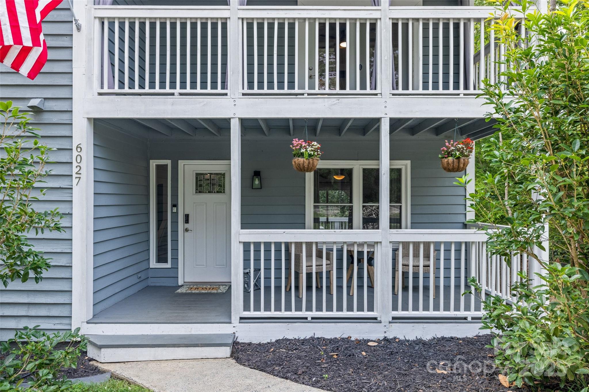 6027 Windjammer Drive Tega Cay, SC 29708 - Photo 2 of 34 a view of a house with a window