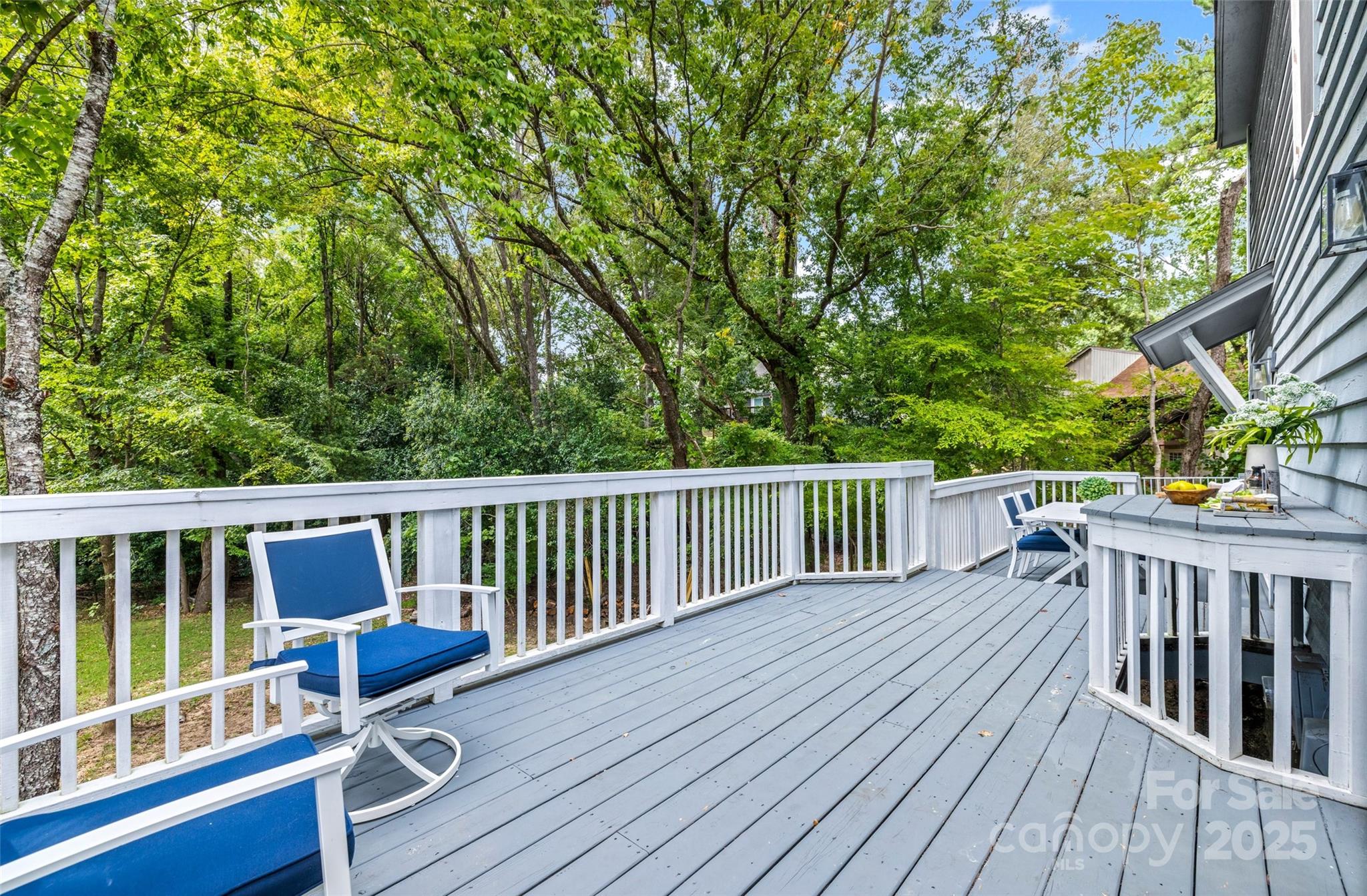 6027 Windjammer Drive Tega Cay, SC 29708 - Photo 28 of 34 a view of balcony with deck and wooden floor