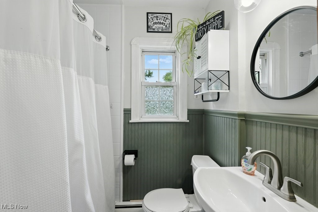 1624 Krumroy Road Akron, OH 44306 - Photo 26 of 47 Full bath featuring a wainscoted wall and a shower with curtain