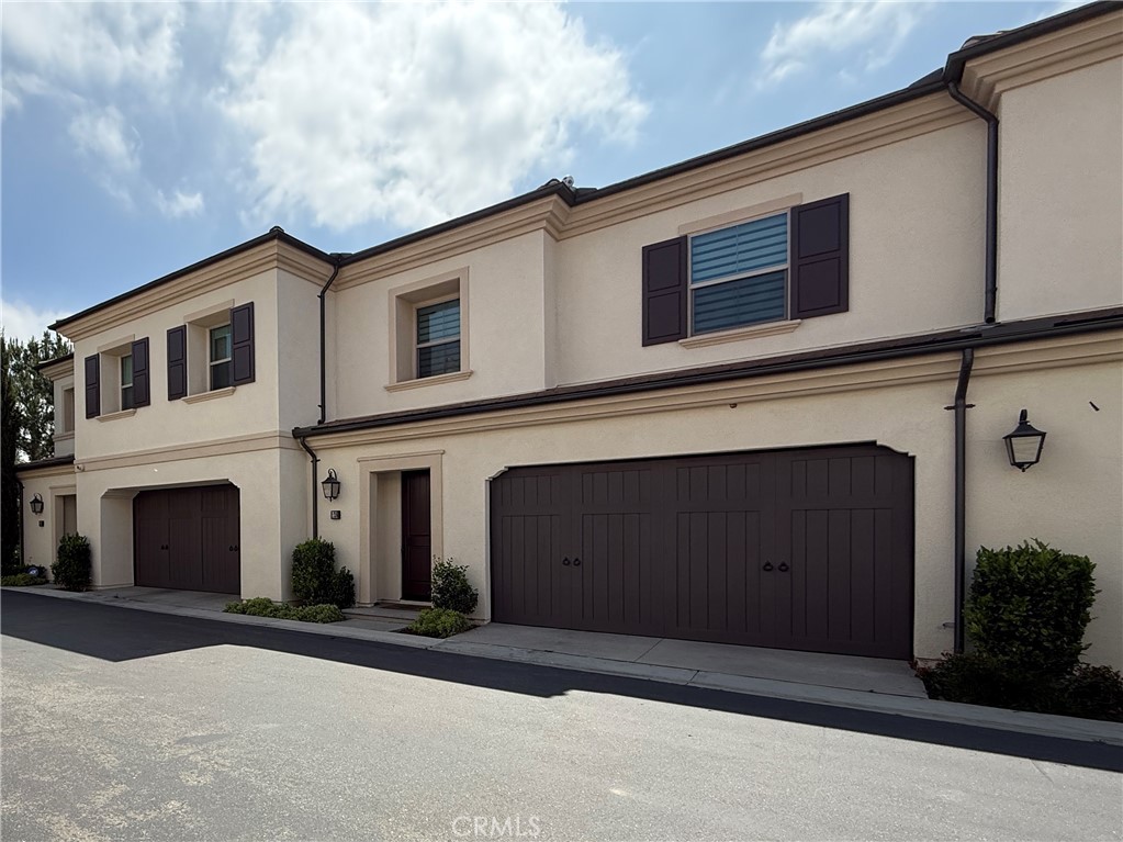 126 Okra Irvine, CA 92618 - Photo 1 of 26 a front view of a house