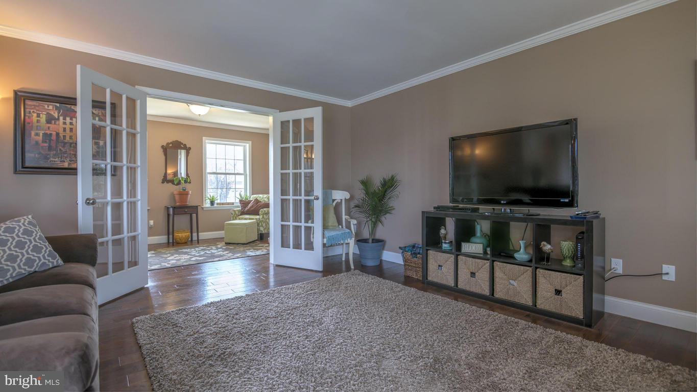 1033 Spring Valley Road Quarryville, PA 17566 - Photo 8 of 33 a living room with furniture and a flat screen tv