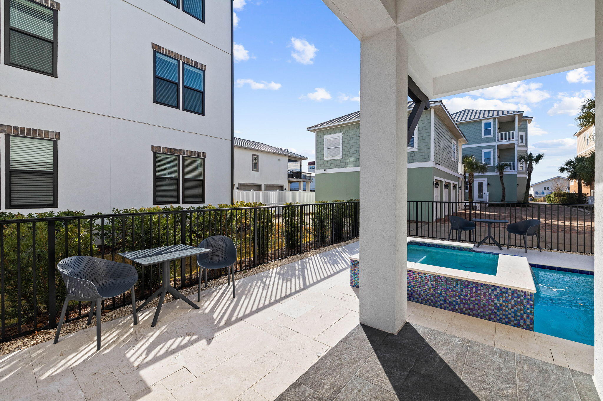 217 Snowdrift Road Miramar Beach, FL 32550 - Photo 12 of 106 a building outdoor space with patio furniture and potted plants