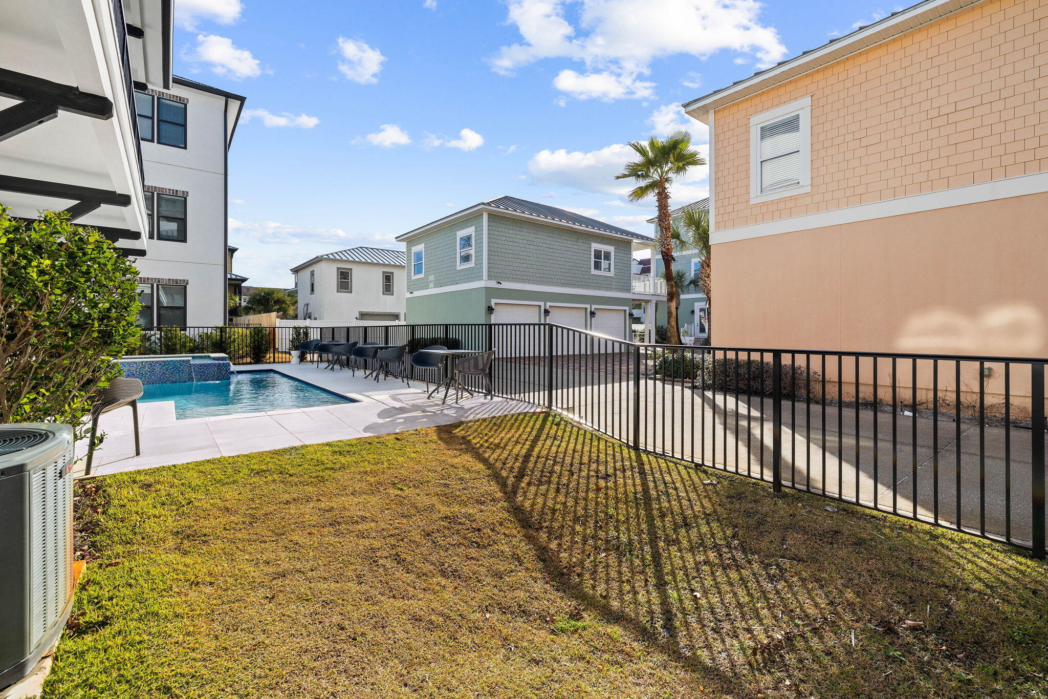 217 Snowdrift Road Miramar Beach, FL 32550 - Photo 18 of 106 a view of a swimming pool with a patio
