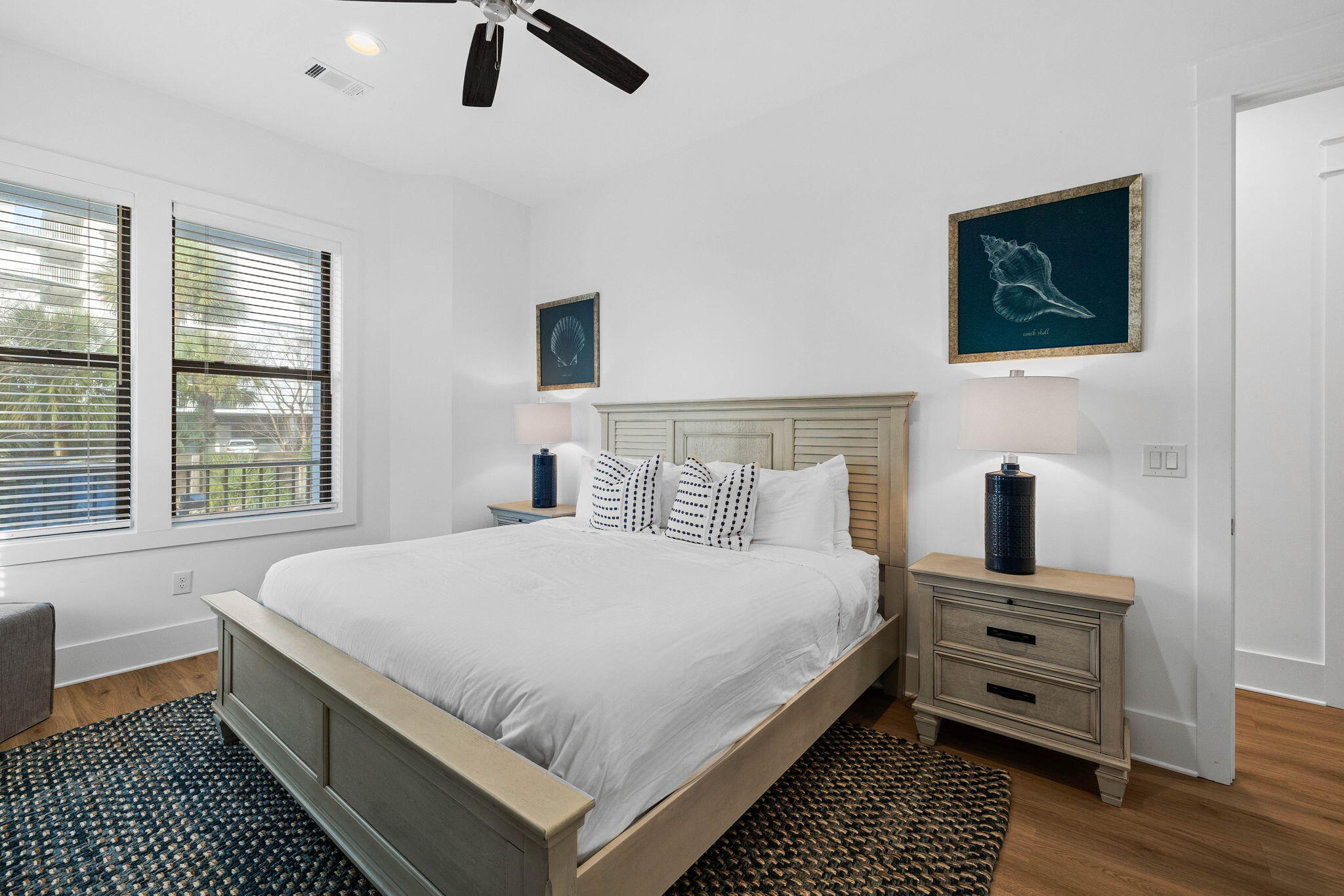 217 Snowdrift Road Miramar Beach, FL 32550 - Photo 24 of 106 a bedroom with a bed and a tv on the dresser