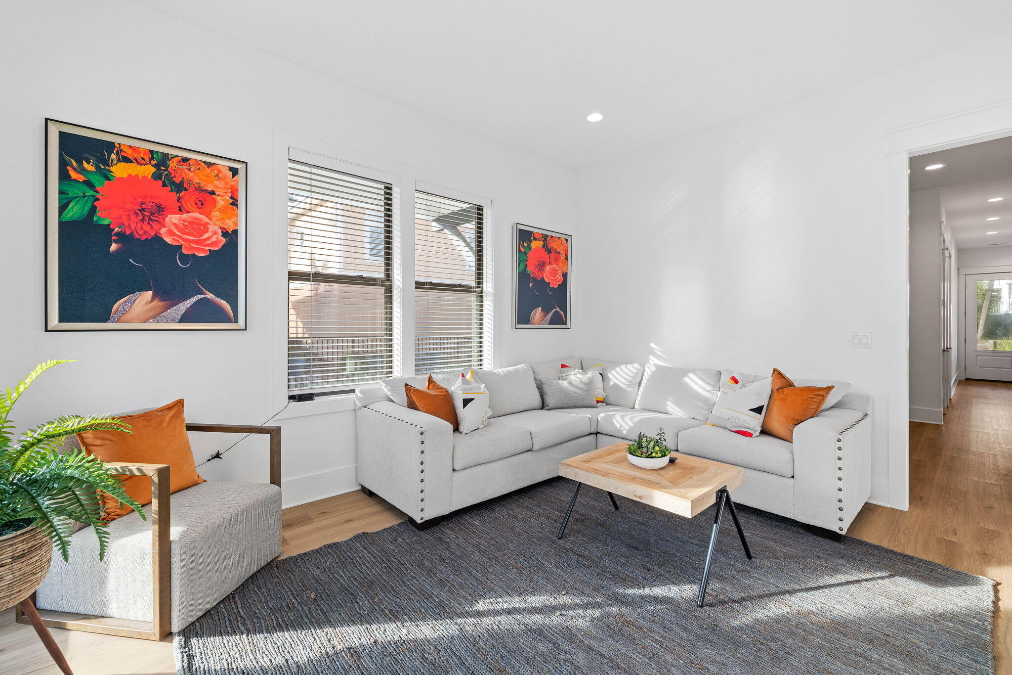 217 Snowdrift Road Miramar Beach, FL 32550 - Photo 36 of 106 a living room with furniture a rug and a painting on the wall