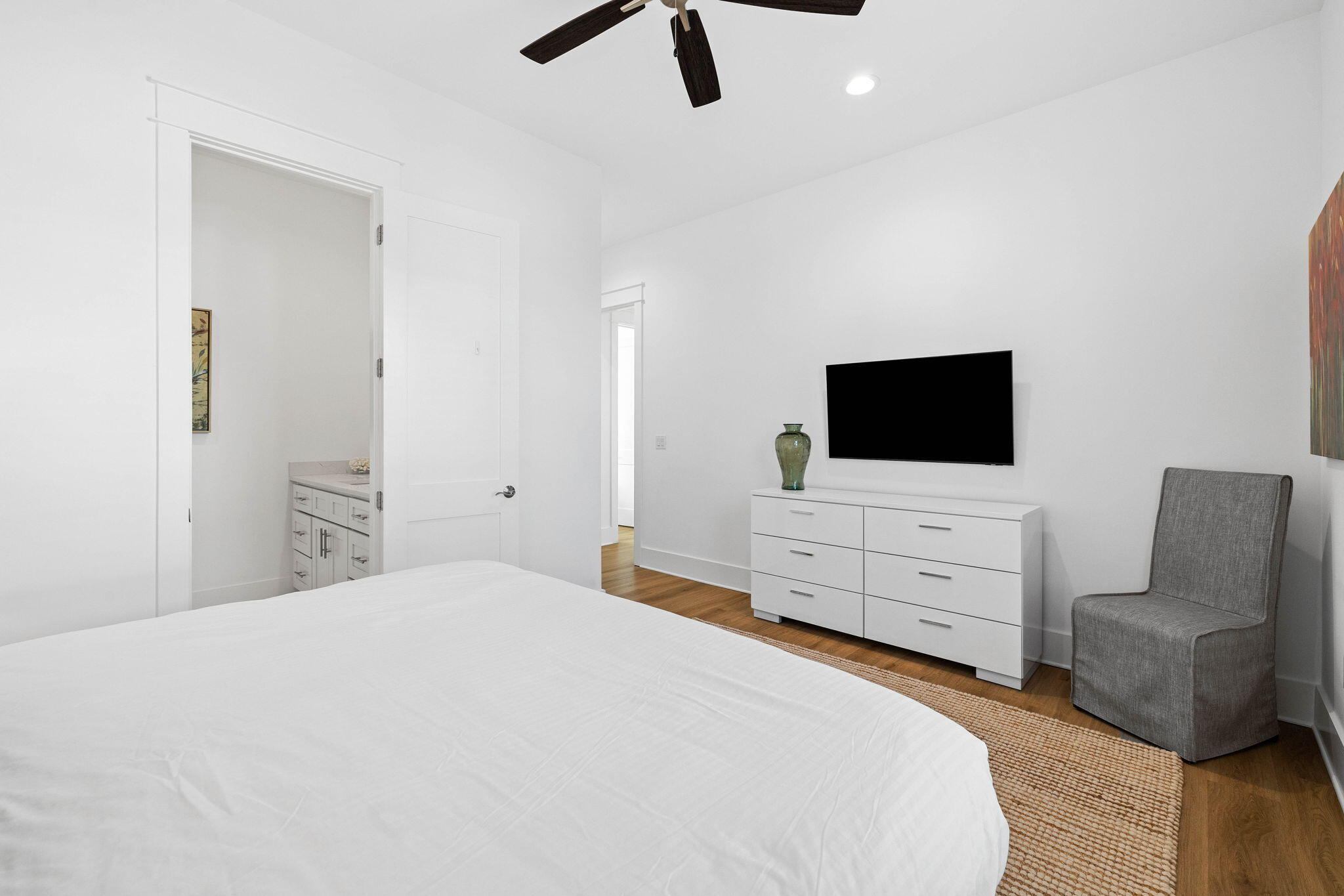 217 Snowdrift Road Miramar Beach, FL 32550 - Photo 47 of 106 a bedroom with a bed and flat screen tv