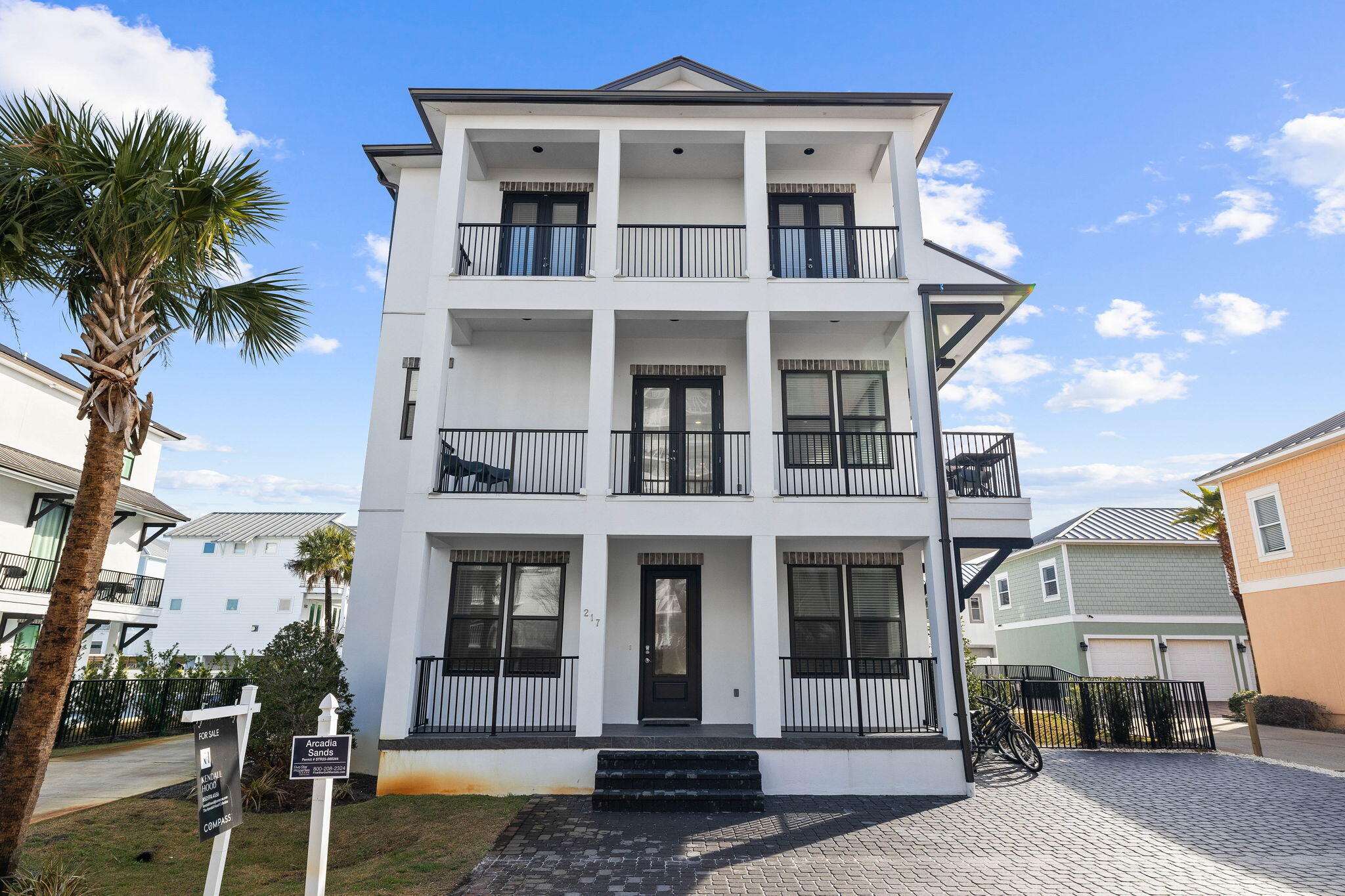 217 Snowdrift Road Miramar Beach, FL 32550 - Photo 7 of 106 a front view of a residential apartment building with a yard