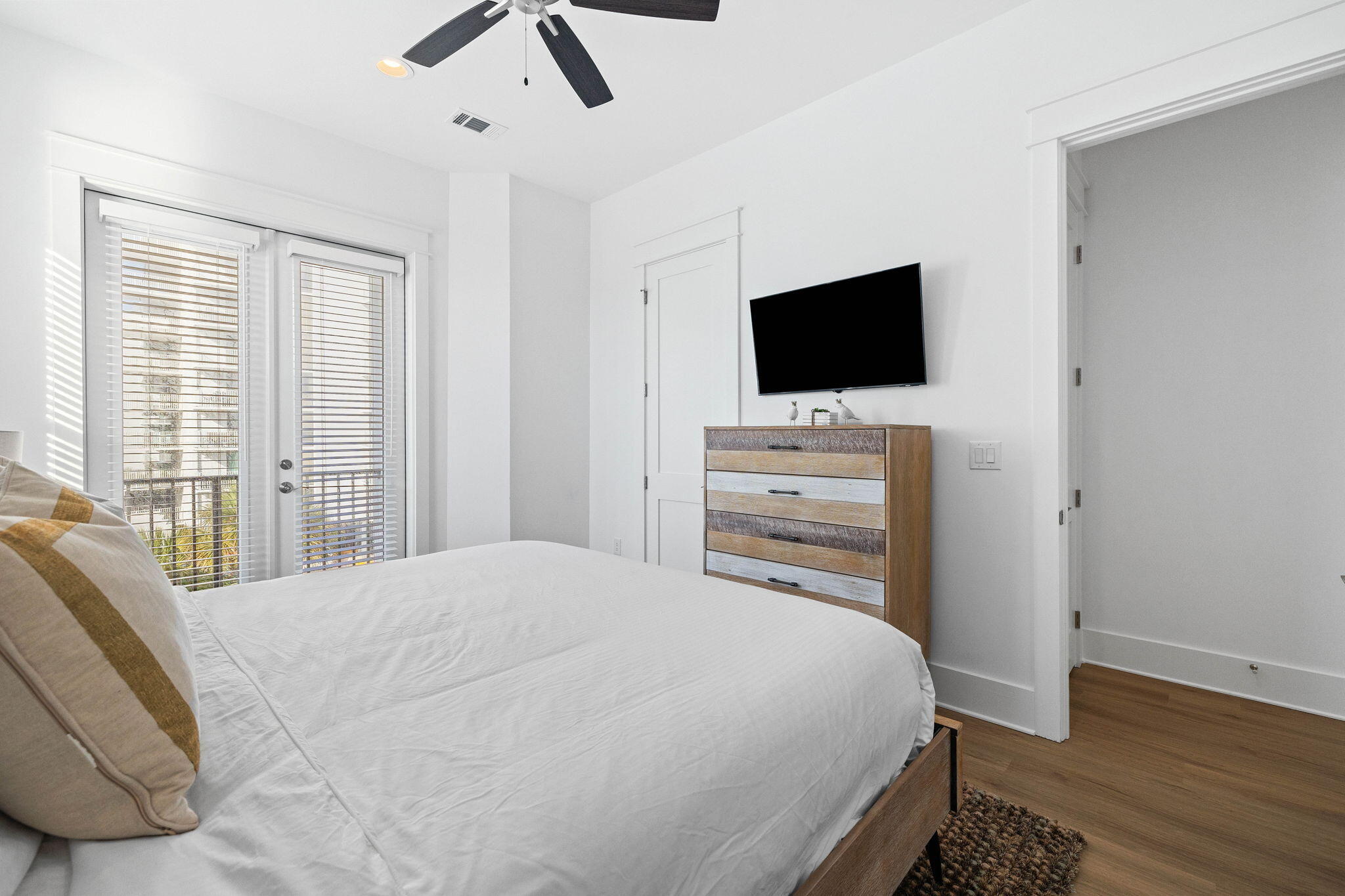 217 Snowdrift Road Miramar Beach, FL 32550 - Photo 95 of 106 a bedroom with a bed and a flat screen tv