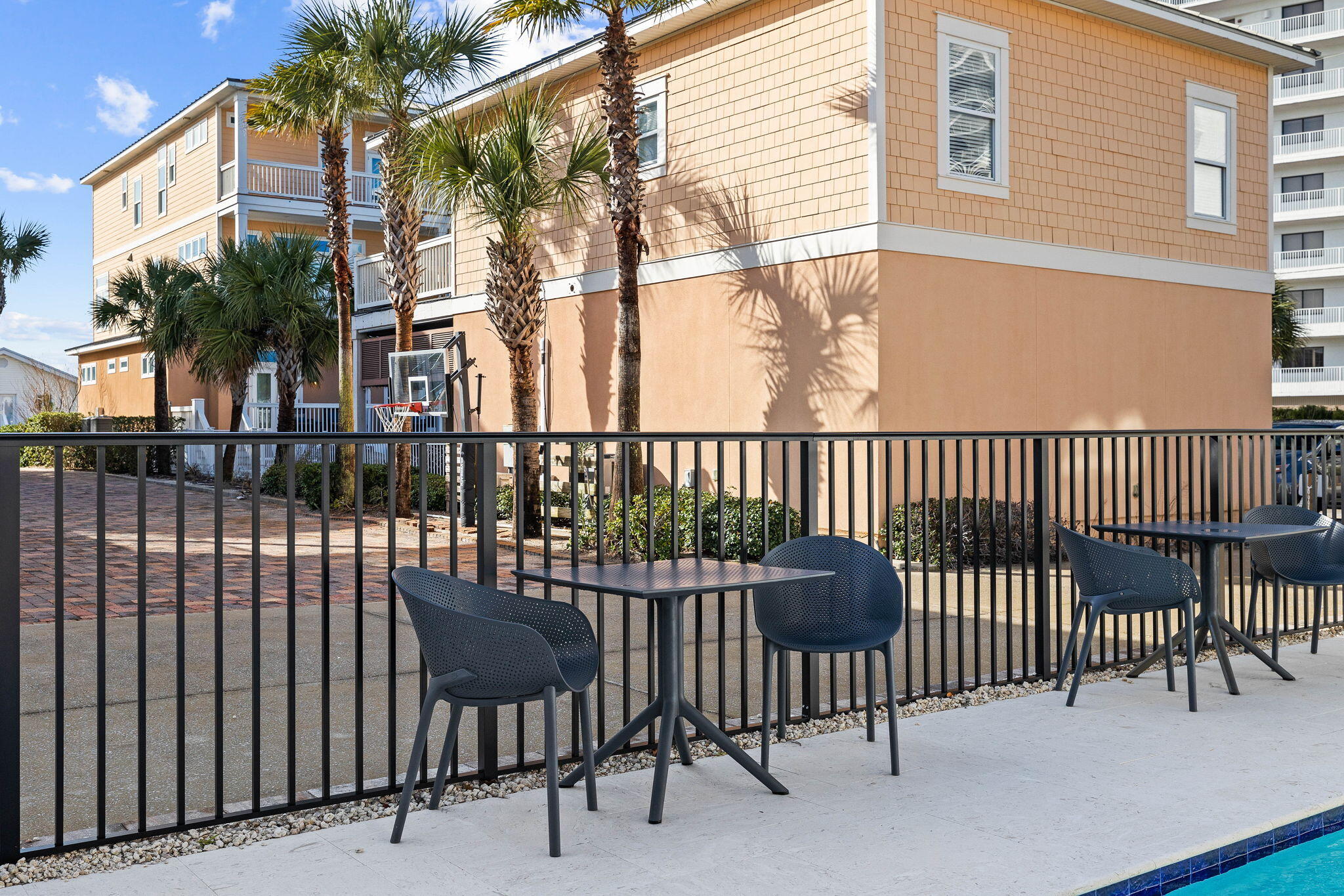 217 Snowdrift Road Miramar Beach, FL 32550 - Photo 10 of 106 a view of a chair and table in the back yard