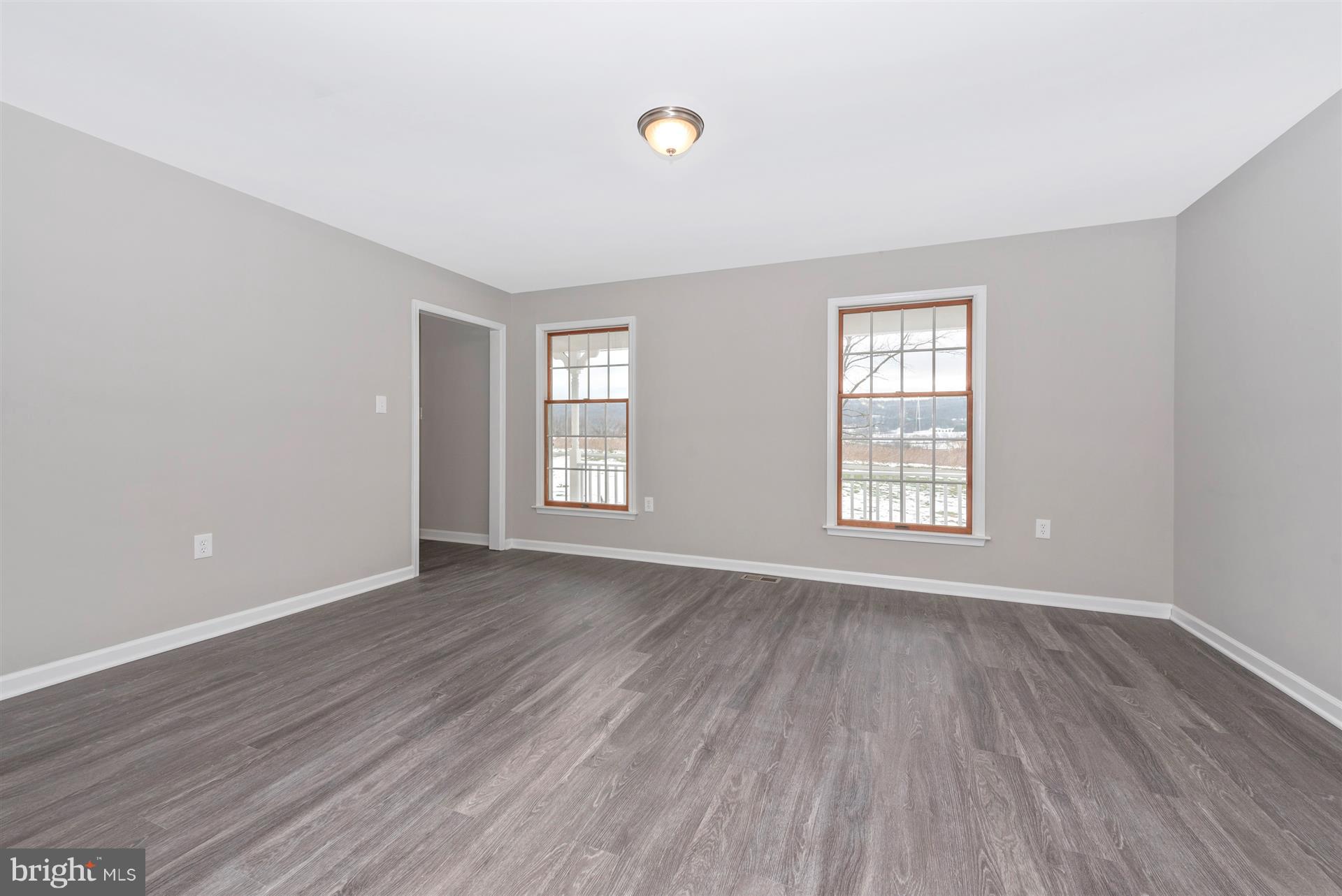 3552 Sigler Road Jefferson, MD 21755 - Photo 7 of 47 Living Room to Foyer from Dinning Room