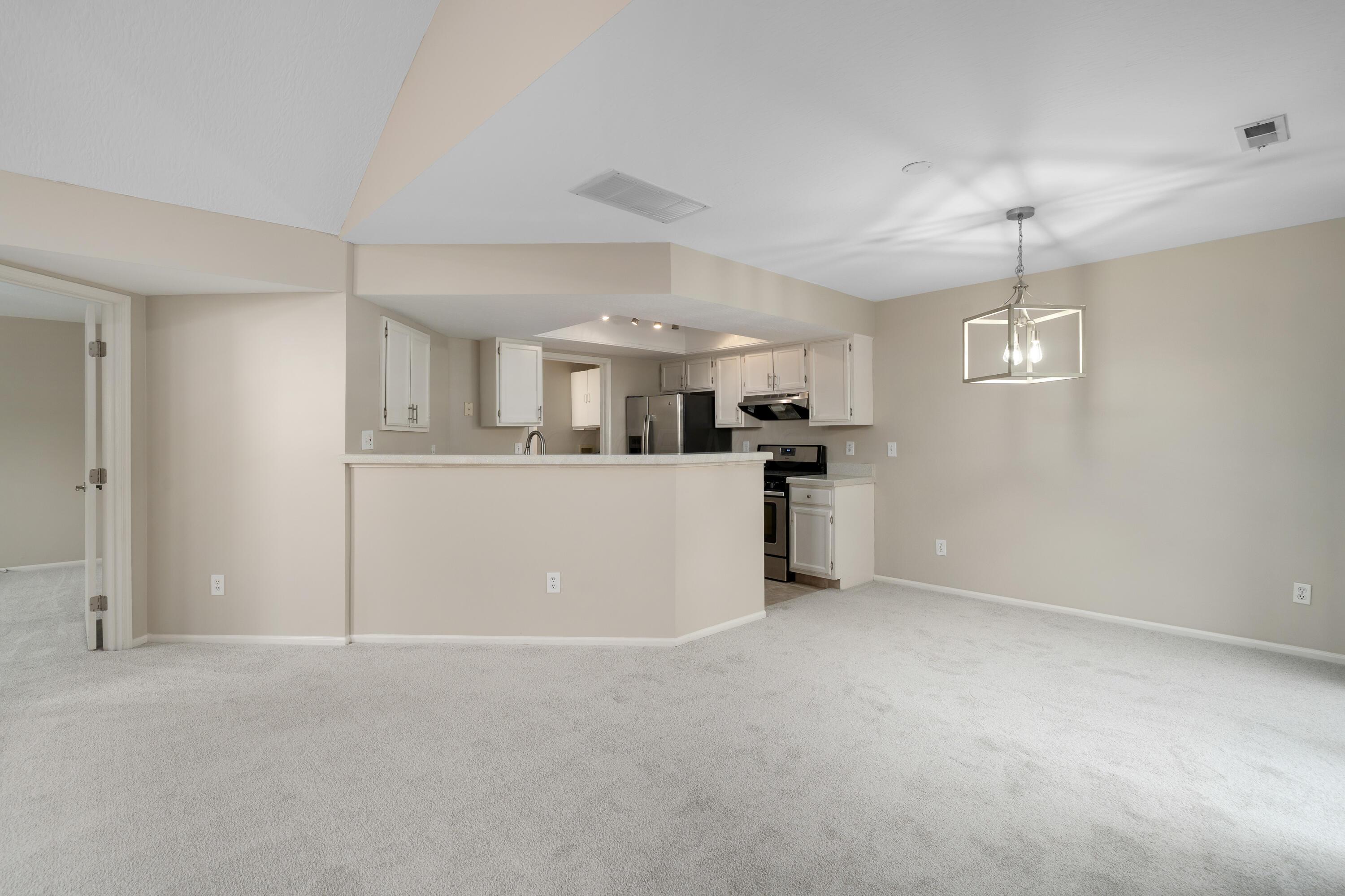 6770 Heatherstone Loop Dublin, OH 43017 - Photo 15 of 32 Living/Dining Areas
