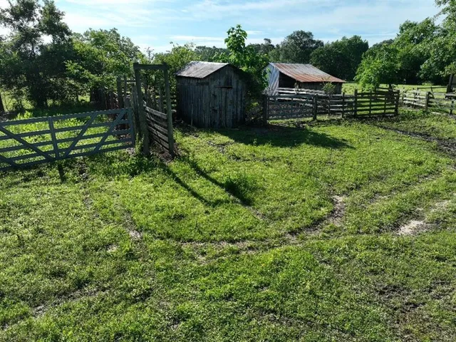 a view of a golf course with a lake