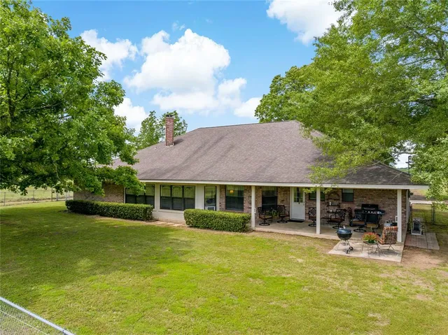 a view of a house with a swimming pool