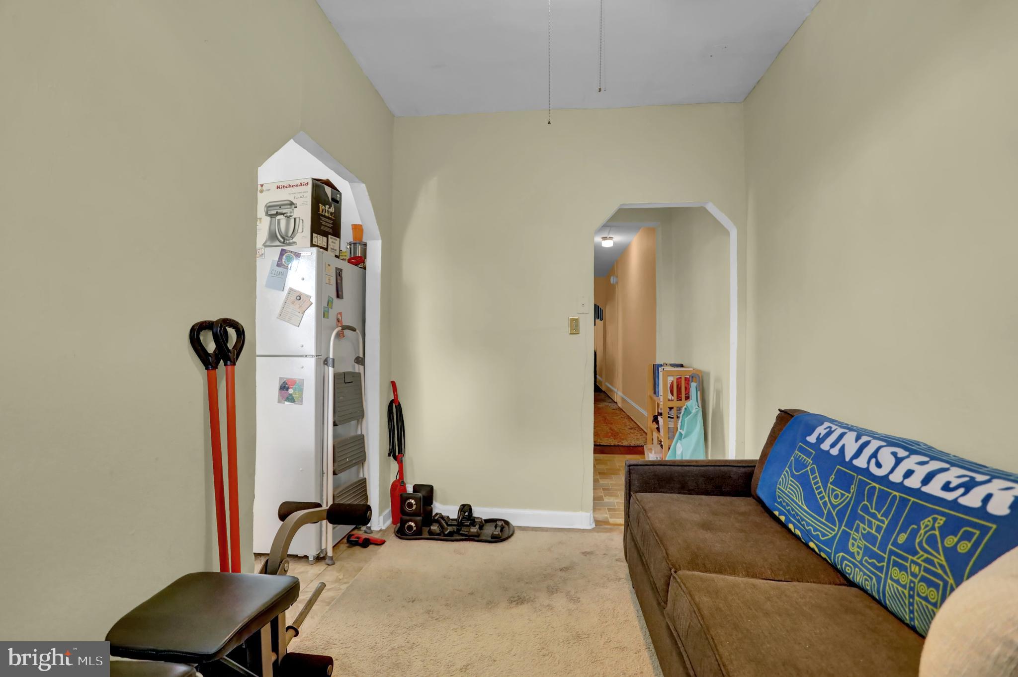 3001 North Calvert Street Baltimore, MD 21218 - Photo 21 of 44 a living room with furniture and a mirror