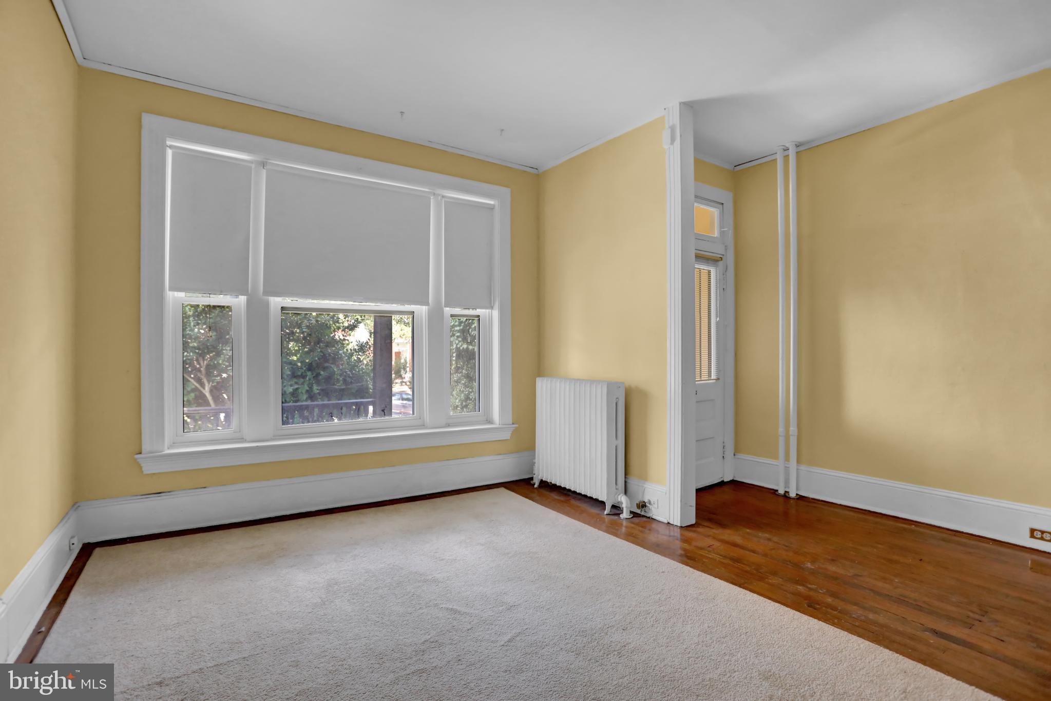 3001 North Calvert Street Baltimore, MD 21218 - Photo 34 of 44 an empty room with windows