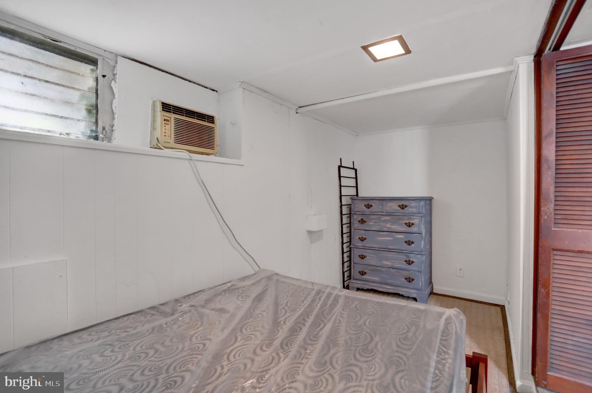 3001 North Calvert Street Baltimore, MD 21218 - Photo 36 of 44 a view of a bedroom with cabinets