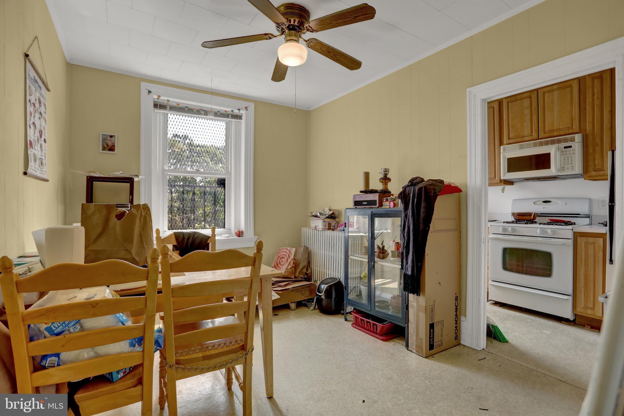 3001 North Calvert Street Baltimore, MD 21218 - Photo 7 of 44 a view of a livingroom with furniture and windows