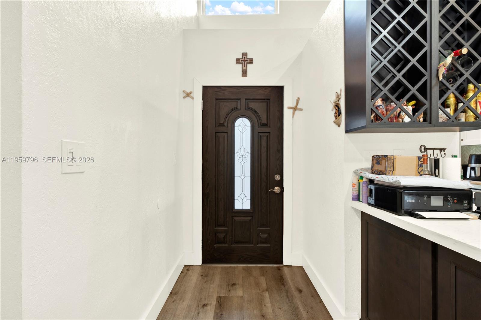 14600 Southwest 124th Place Miami, FL 33186 - Photo 5 of 34 a front view of a house with entryway