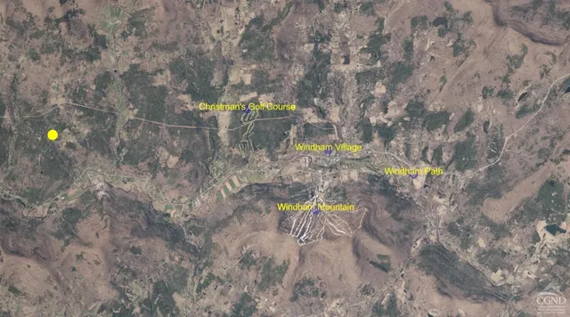 a view of a outdoor space and trees all around