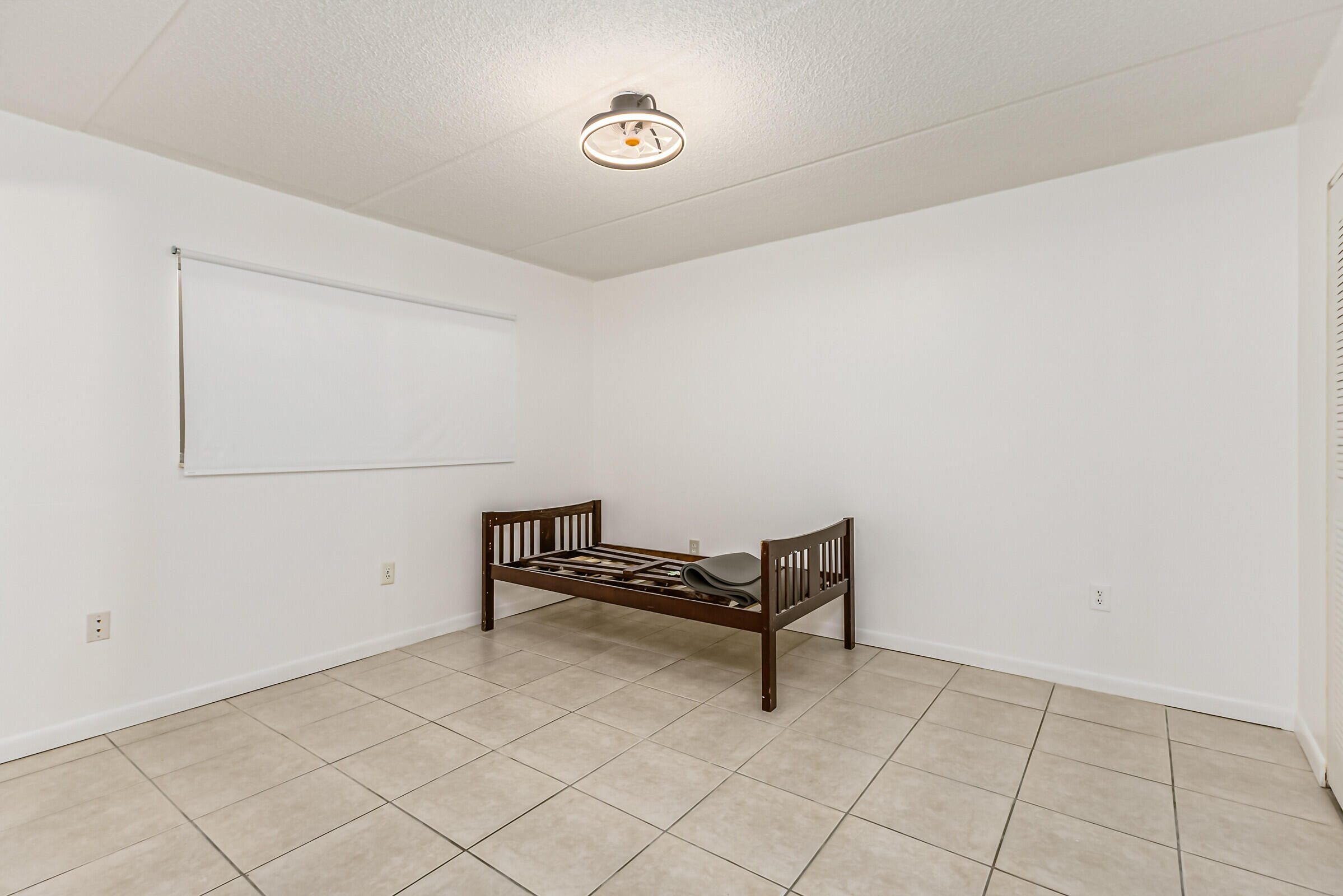 720 Ridge Club Drive, Unit 43 Melbourne, FL 32934 - Photo 15 of 27 a bench with bench in wooden floor