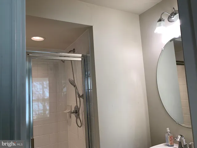 a bathroom with a mirror