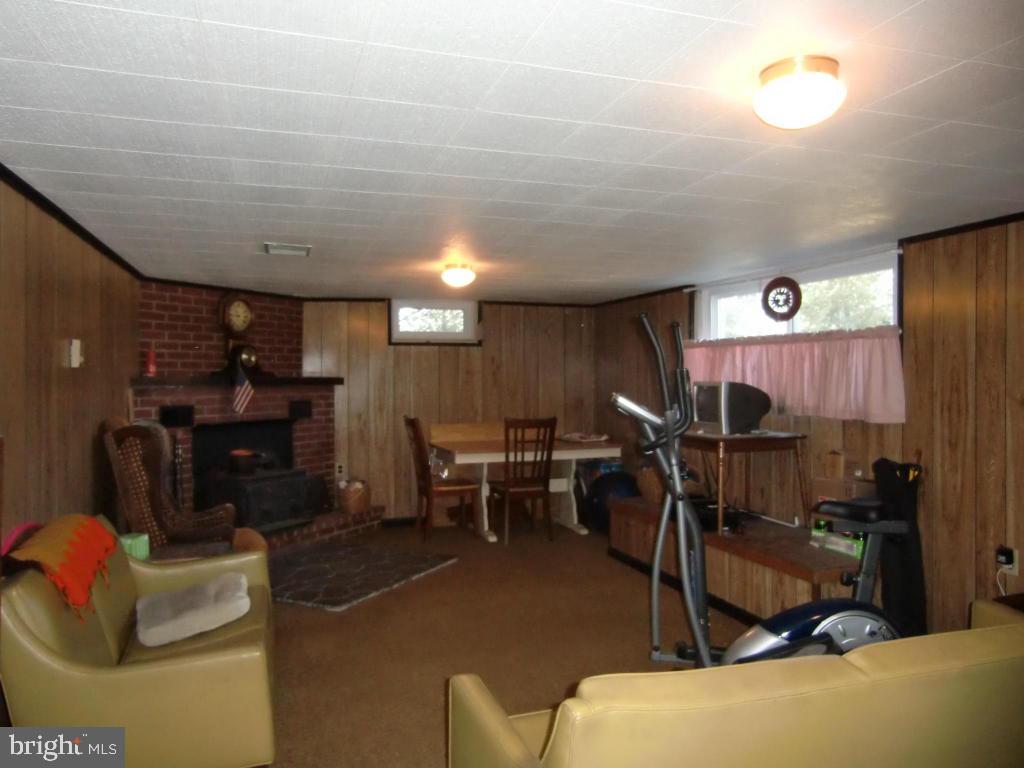 2293 North Colebrook Road Manheim, PA 17545 - Photo 3 of 17 a view of a livingroom with furniture and a gym equipment