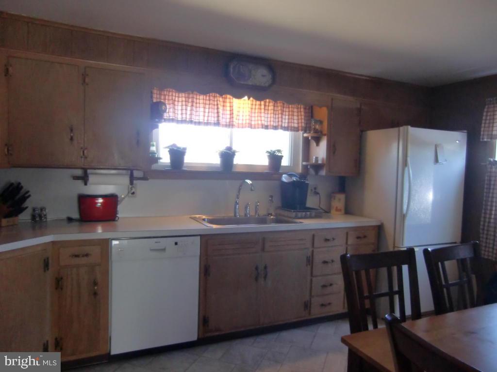 2293 North Colebrook Road Manheim, PA 17545 - Photo 5 of 17 a kitchen with cabinets and window