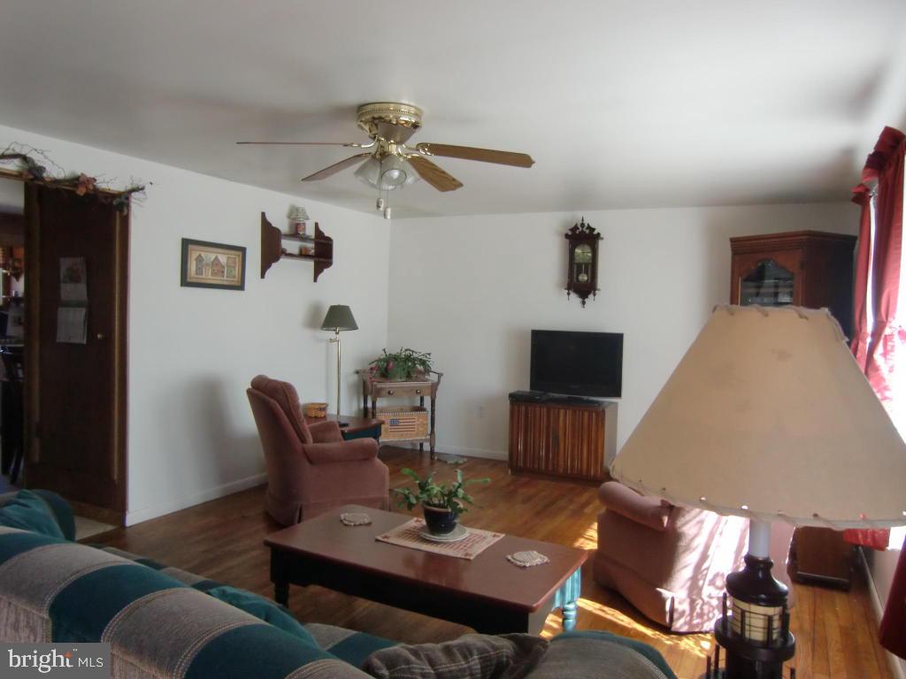 2293 North Colebrook Road Manheim, PA 17545 - Photo 6 of 17 a living room with furniture and a flat screen tv